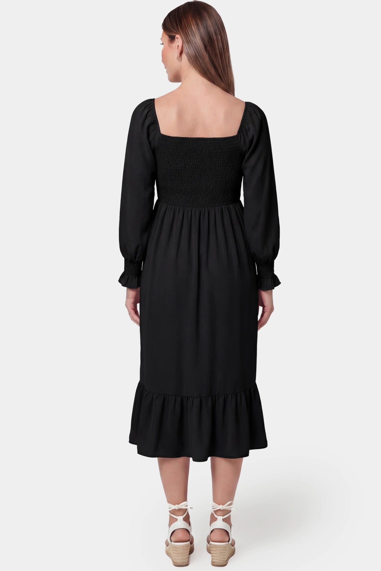 Smocked Square Neck Ruffle Hem Midi Maternity Dress Smocked square neck ruffle hem midi maternity dress in black featuring long sleeves and ruffle hem in back view on a pregnant model