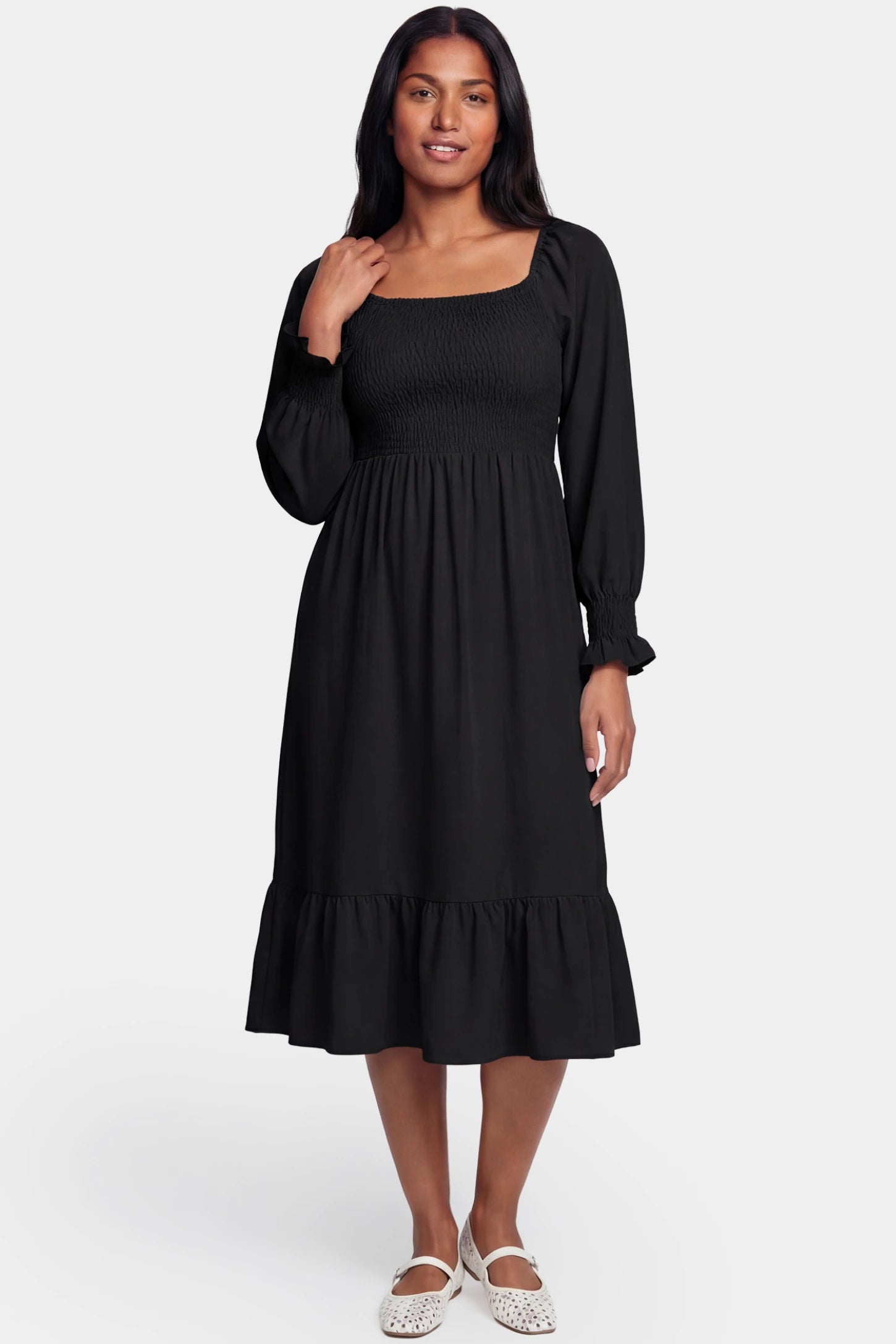 Smocked Square Neck Ruffle Hem Midi Maternity Dress Smocked square neck ruffle hem midi maternity dress in black featuring long sleeves and square neck in front view on a postpartum model