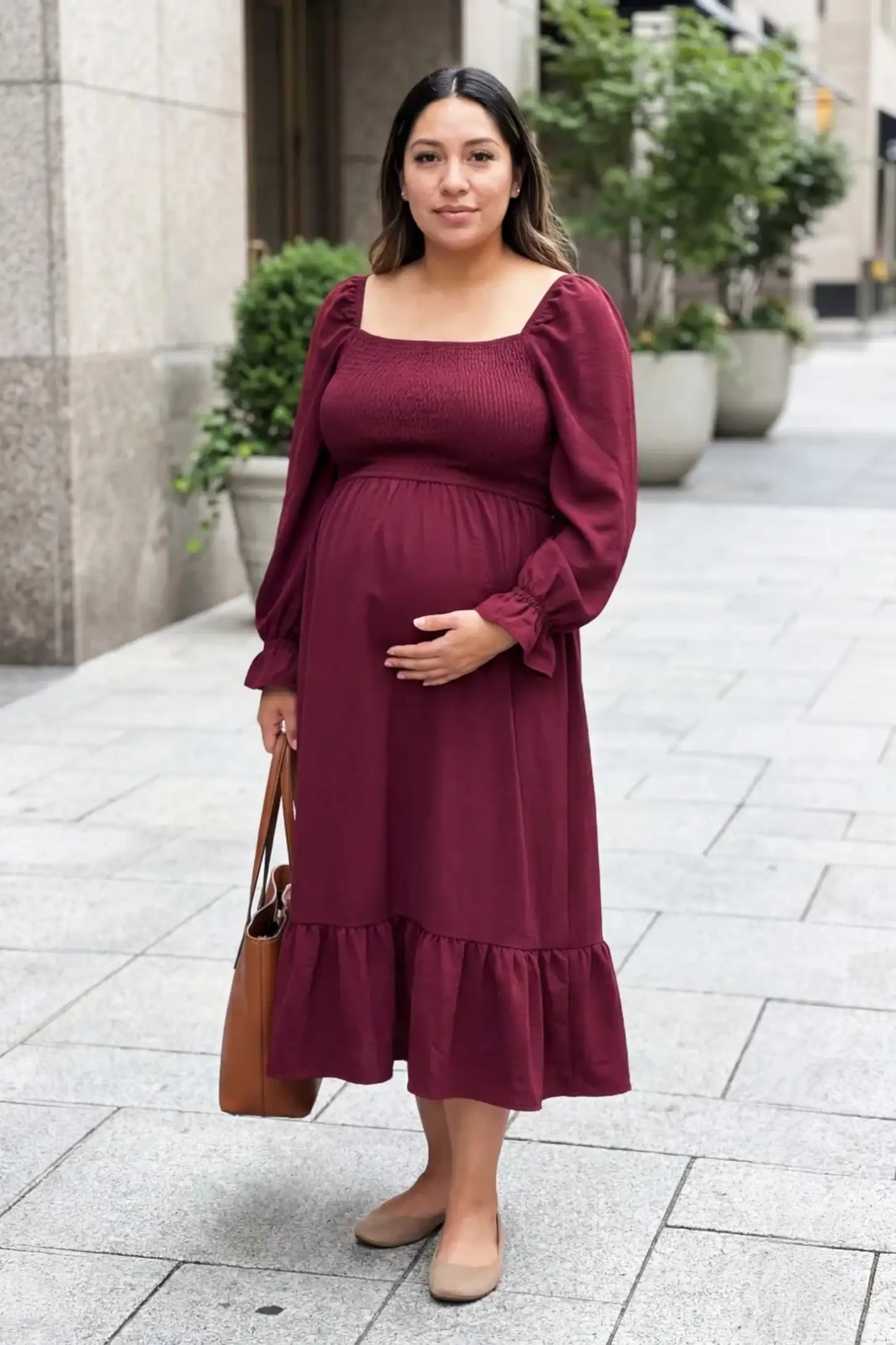 Smocked square neck ruffle hem midi maternity dress in burgundy with elegant ruffle hem detail, on editorial lifestyle model