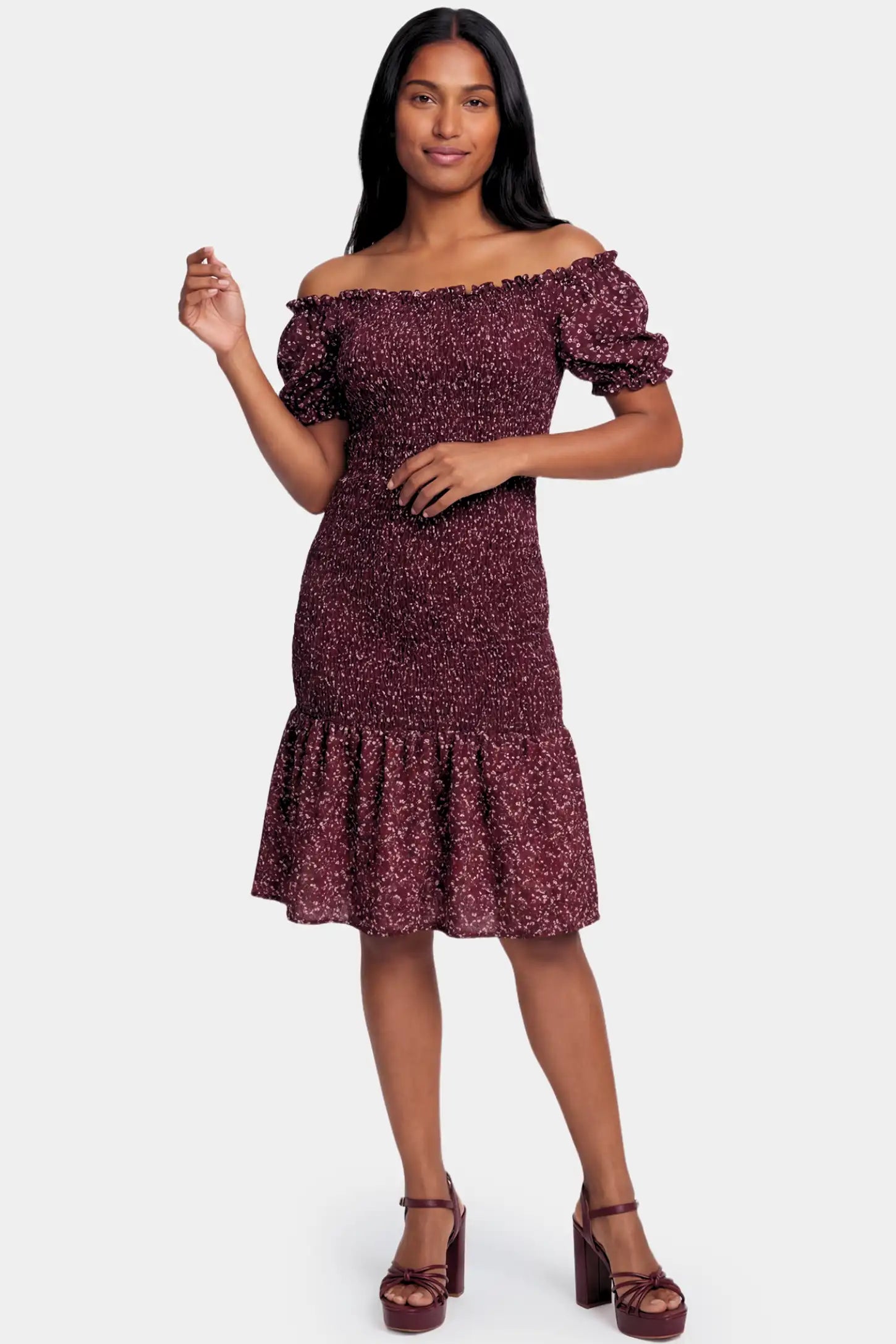 Short Puff Sleeve Smocked Maternity Midi Dress Short Puff Sleeve Smocked Maternity Midi Dress in burgundy floral featuring off shoulder neckline and ruffle hem on a non pregnant model.