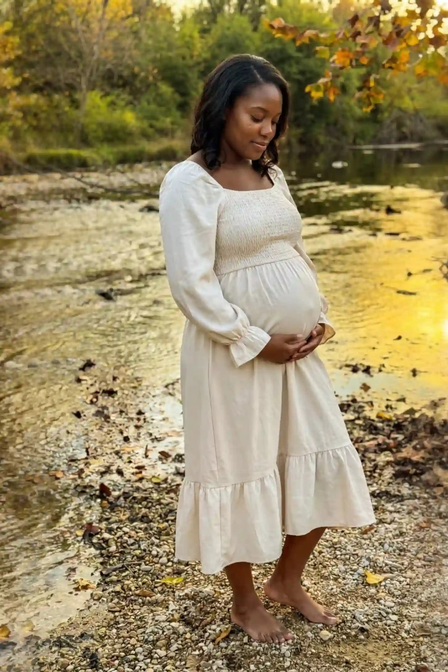 Smocked Square Neck Ruffle Hem Midi Maternity Dress Smocked square neck ruffle hem midi maternity dress in off-white with elegant ruffle hem detail, on editorial lifestyle model