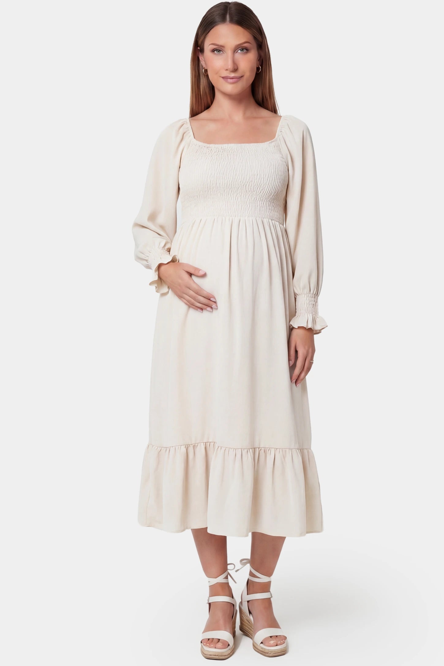 Smocked Square Neck Ruffle Hem Midi Maternity Dress Smocked square neck ruffle hem midi maternity dress in off-white featuring chic square neckline in front view on a pregnant model