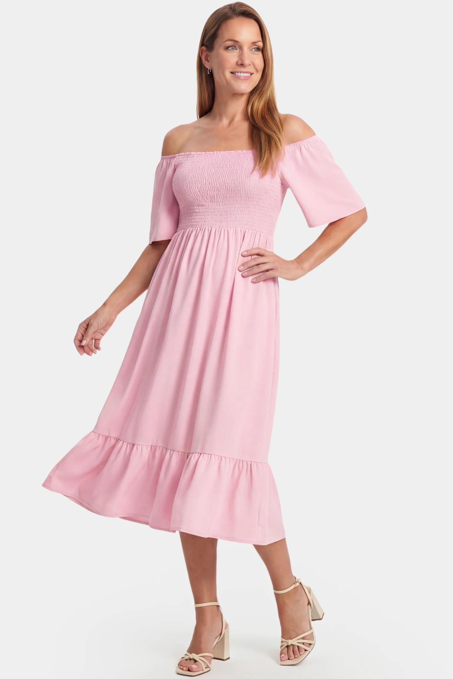 Off-Shoulder Smocked Short Sleeve A-Line Midi Maternity Dress Off-shoulder smocked short sleeve A-line midi maternity dress in pink featuring smocked elastic waist and short sleeve in front view on a postpartum model