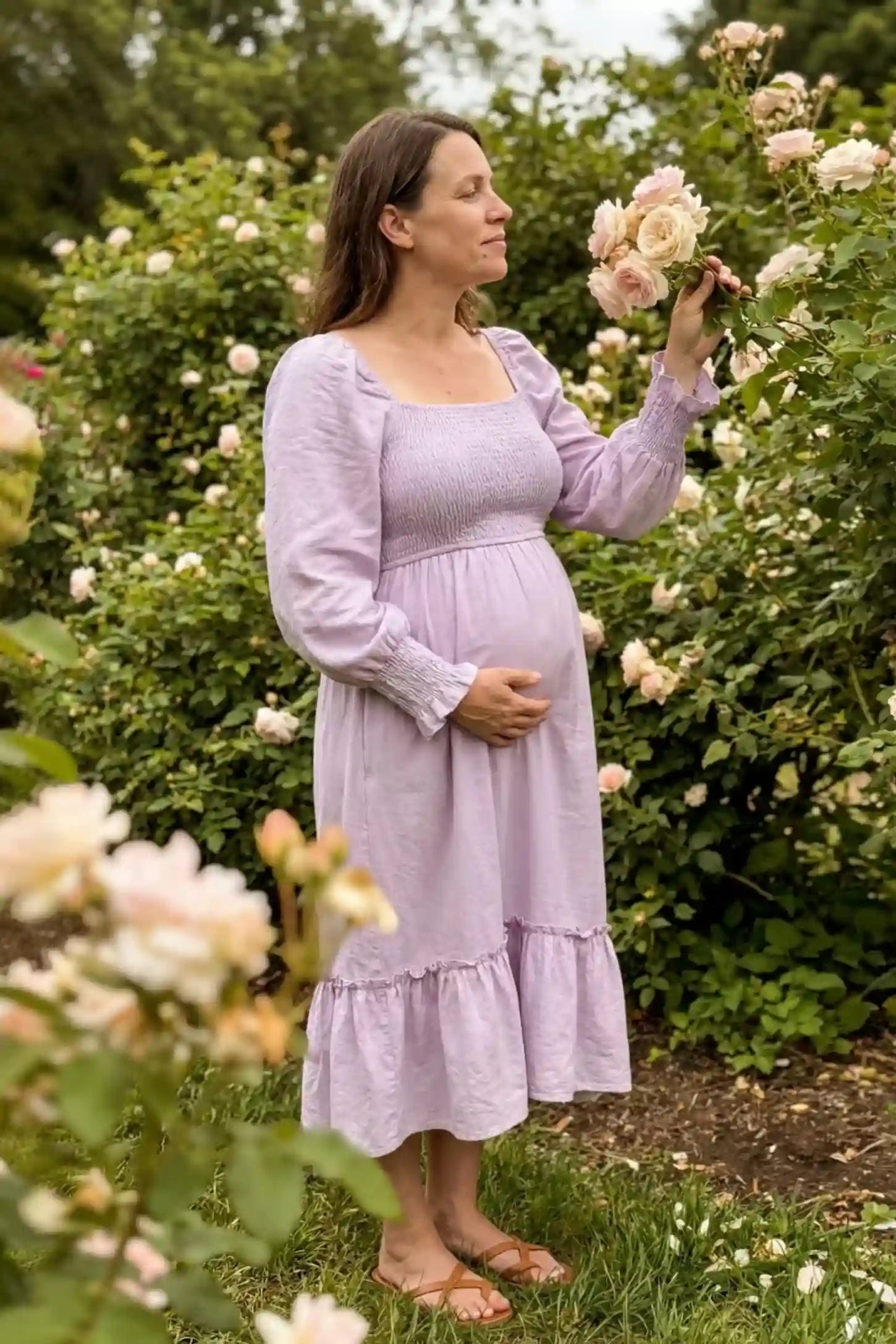 Smocked Square Neck Ruffle Hem Midi Maternity Dress Smocked square neck ruffle hem midi maternity dress in purple with elegant ruffle hem detail, on editorial lifestyle model