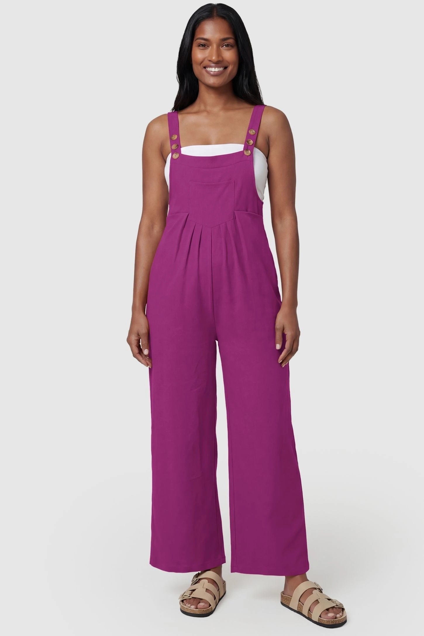 Full-Length Pocketed Maternity Jumpsuit Full-Length Pocketed Maternity Jumpsuit in Wine Red featuring adjustable straps and a relaxed fit on a model, postpartum.