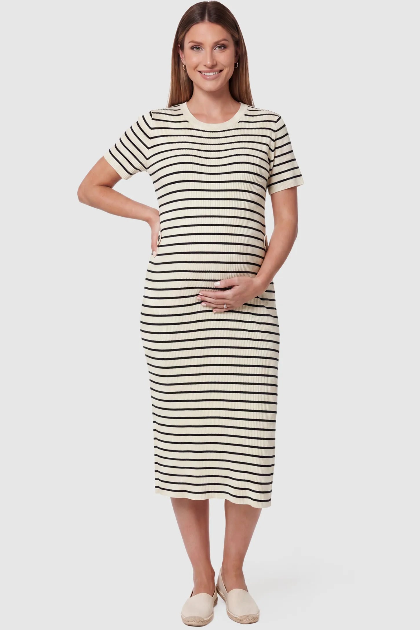 Soft Knit Short Sleeve Bodycon Maternity Midi Dress Soft Knit Short Sleeve Bodycon Maternity Midi Dress in beige stripes with classic stripes, front view on pregnant model