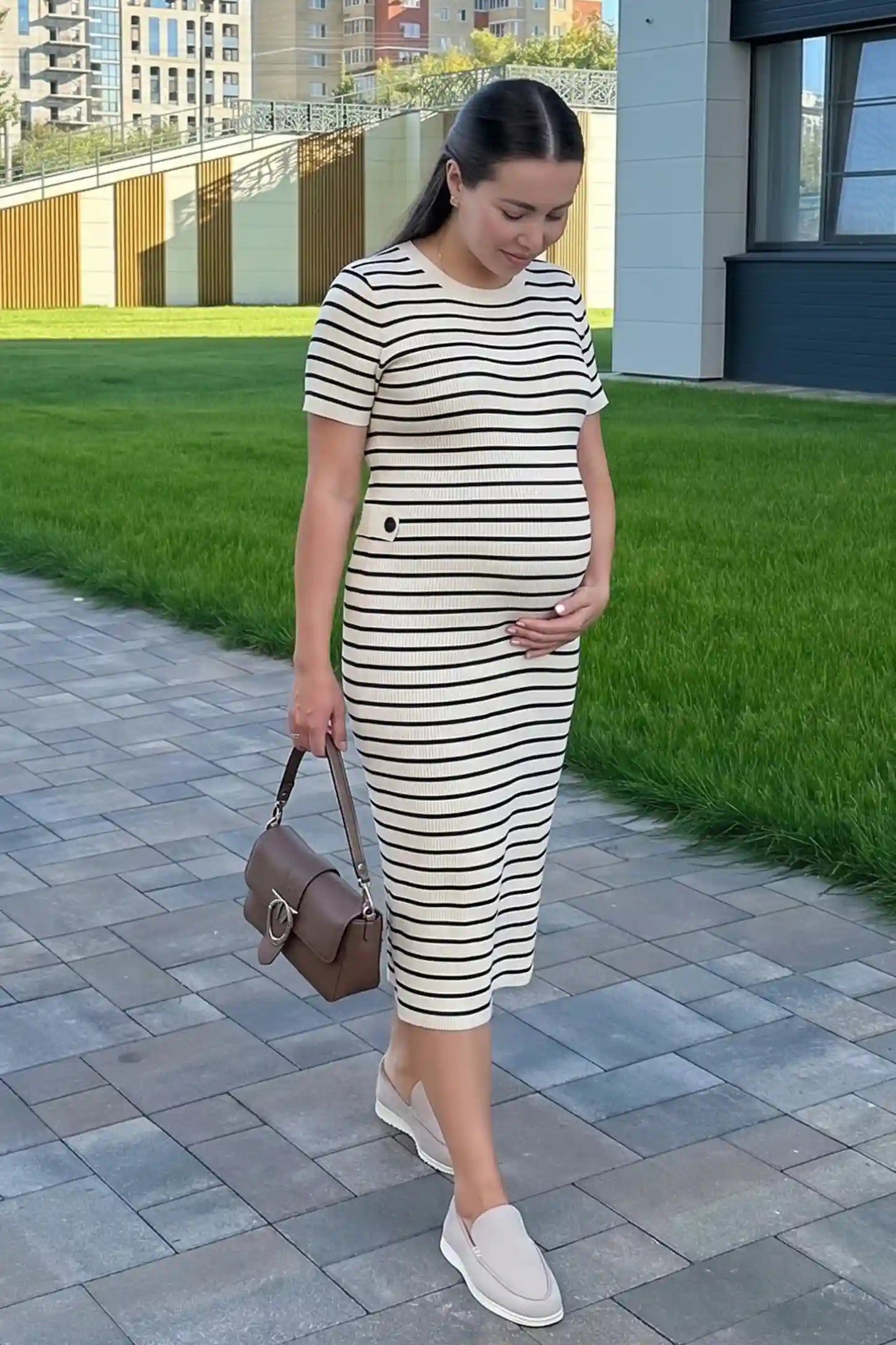 Soft Knit Short Sleeve Bodycon Maternity Midi Dress Soft Knit Short Sleeve Bodycon Maternity Midi Dress in beige stripes with classic stripes, front view on pregnant model
