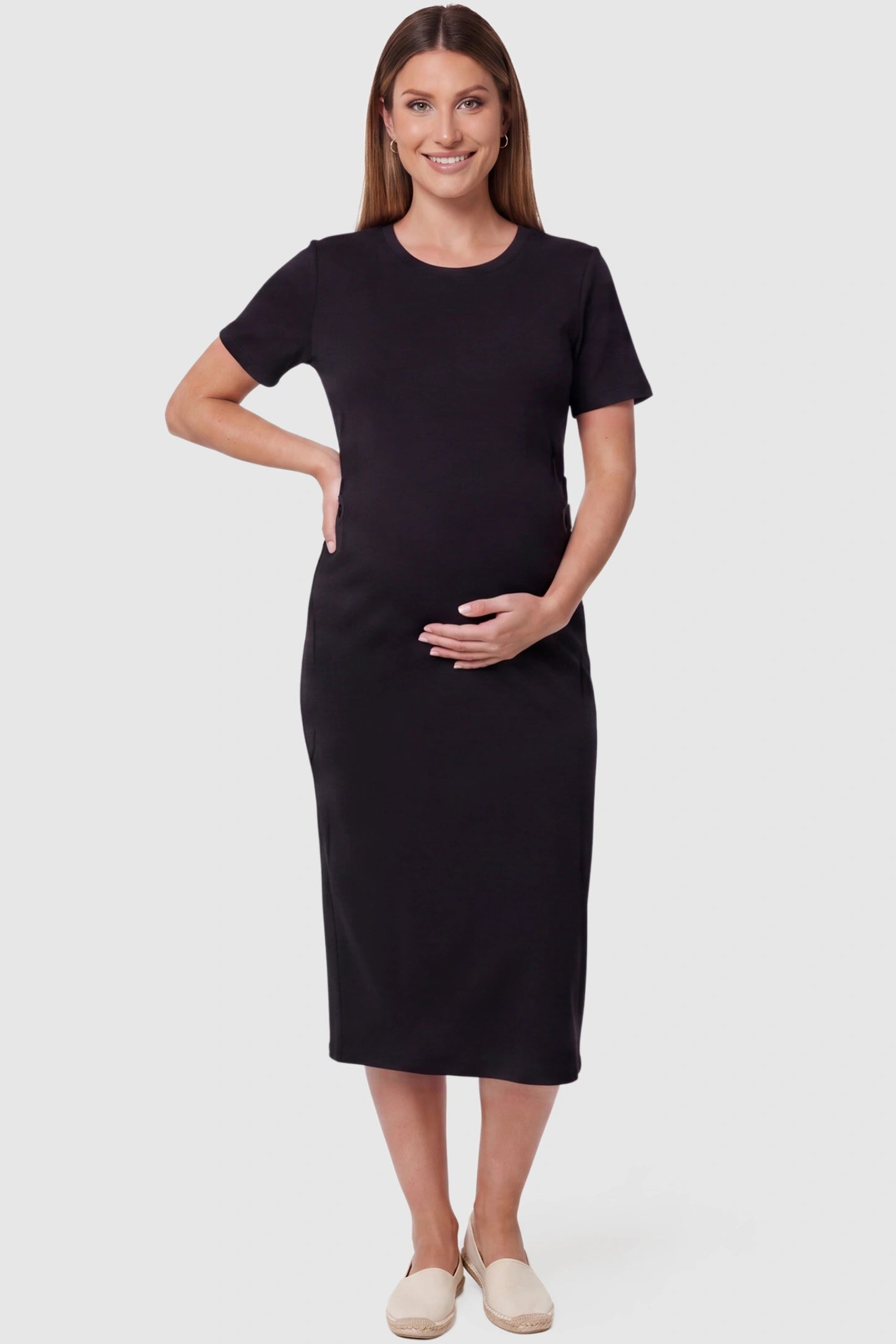 Soft Knit Short Sleeve Bodycon Maternity Midi Dress Soft Knit Short Sleeve Bodycon Maternity Midi Dress in black with round neck & short sleeves, front view on pregnant model