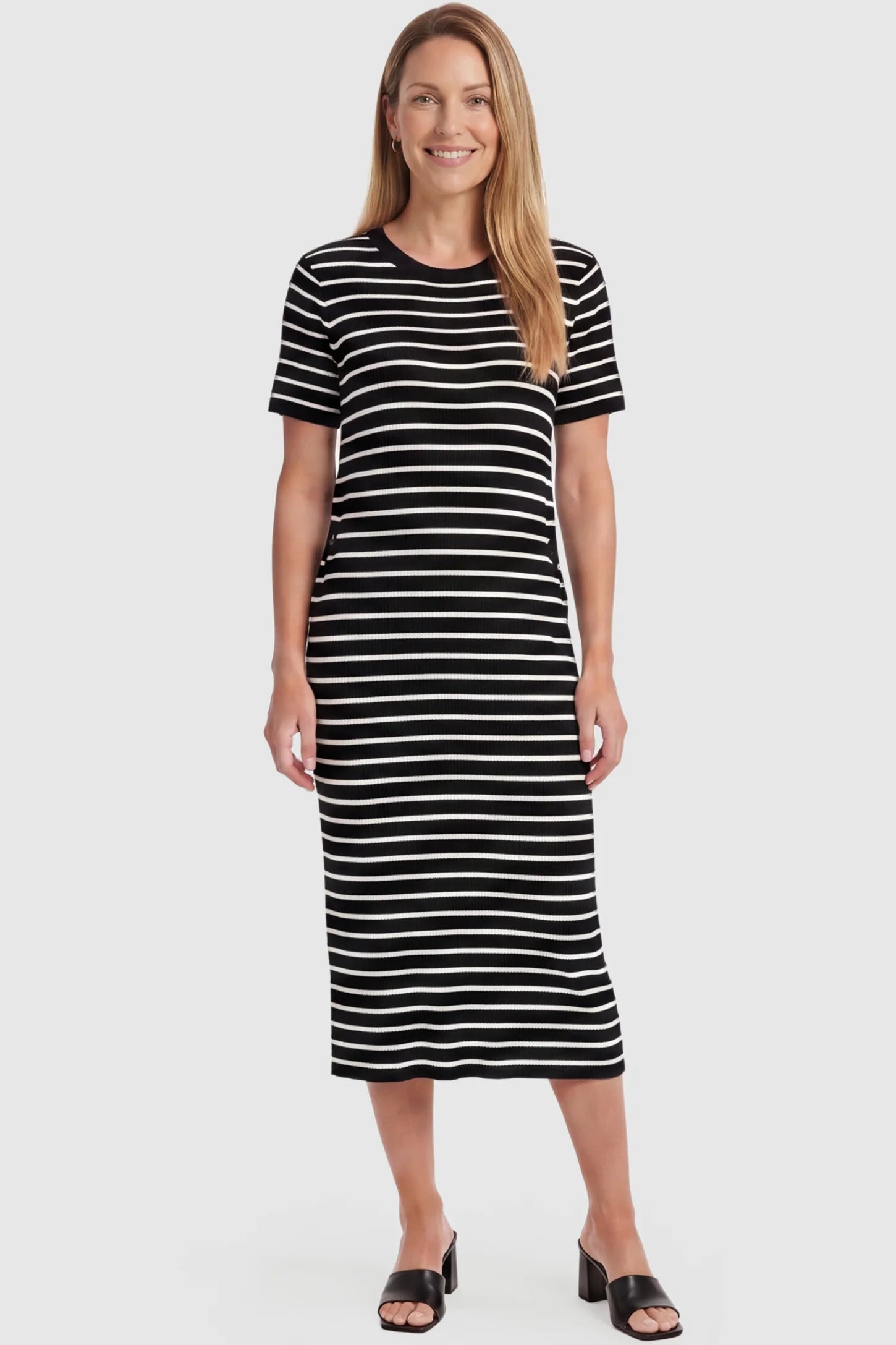 Soft Knit Short Sleeve Bodycon Maternity Midi Dress Soft Knit Short Sleeve Bodycon Maternity Midi Dress in black stripes with classic stripes, front view on postpartum model