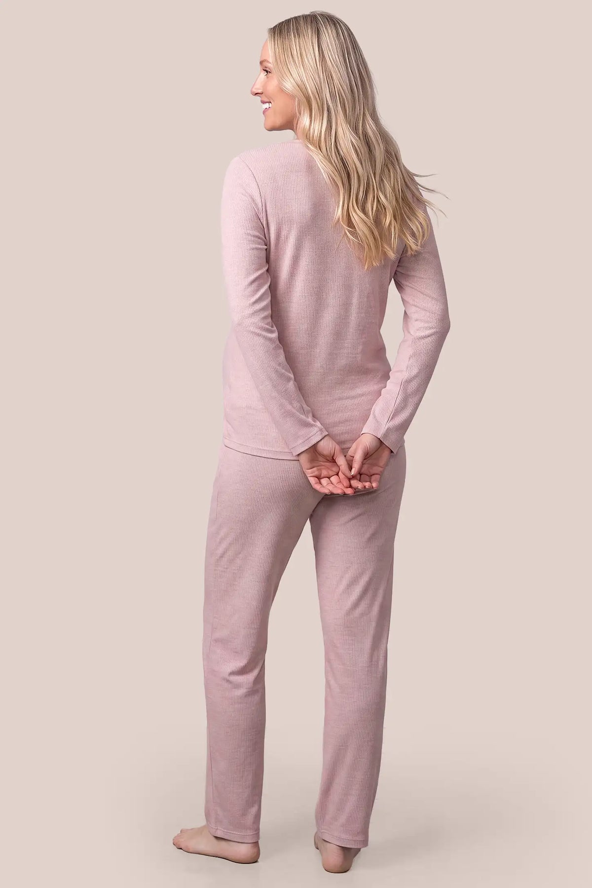 Soft Rib Knit Maternity & Nursing PJ Set with Cami, Cardigan & Pants Soft Rib Knit Maternity & Nursing Pajama Set with Cami, Cardigan & Pants in Soft Pink featuring fine rib knit texture, clean stitching, long sleeve cardigan, and relaxed fit on a pregnant model, back view.