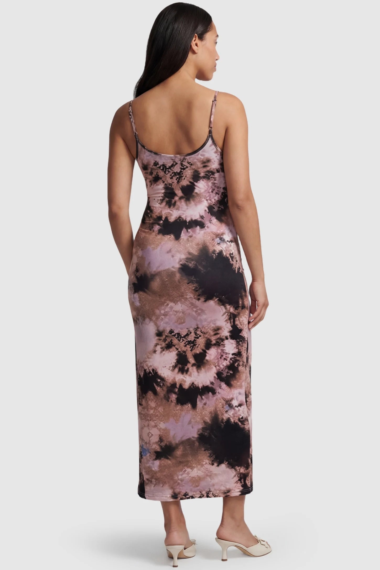 Tie Dye Spaghetti Strap Bodycon Maternity Dress Tie Dye Spaghetti Strap Bodycon Maternity Dress in Pinkish Tie-dye featuring a butt lifting construction with thin straps on a pregnant model.