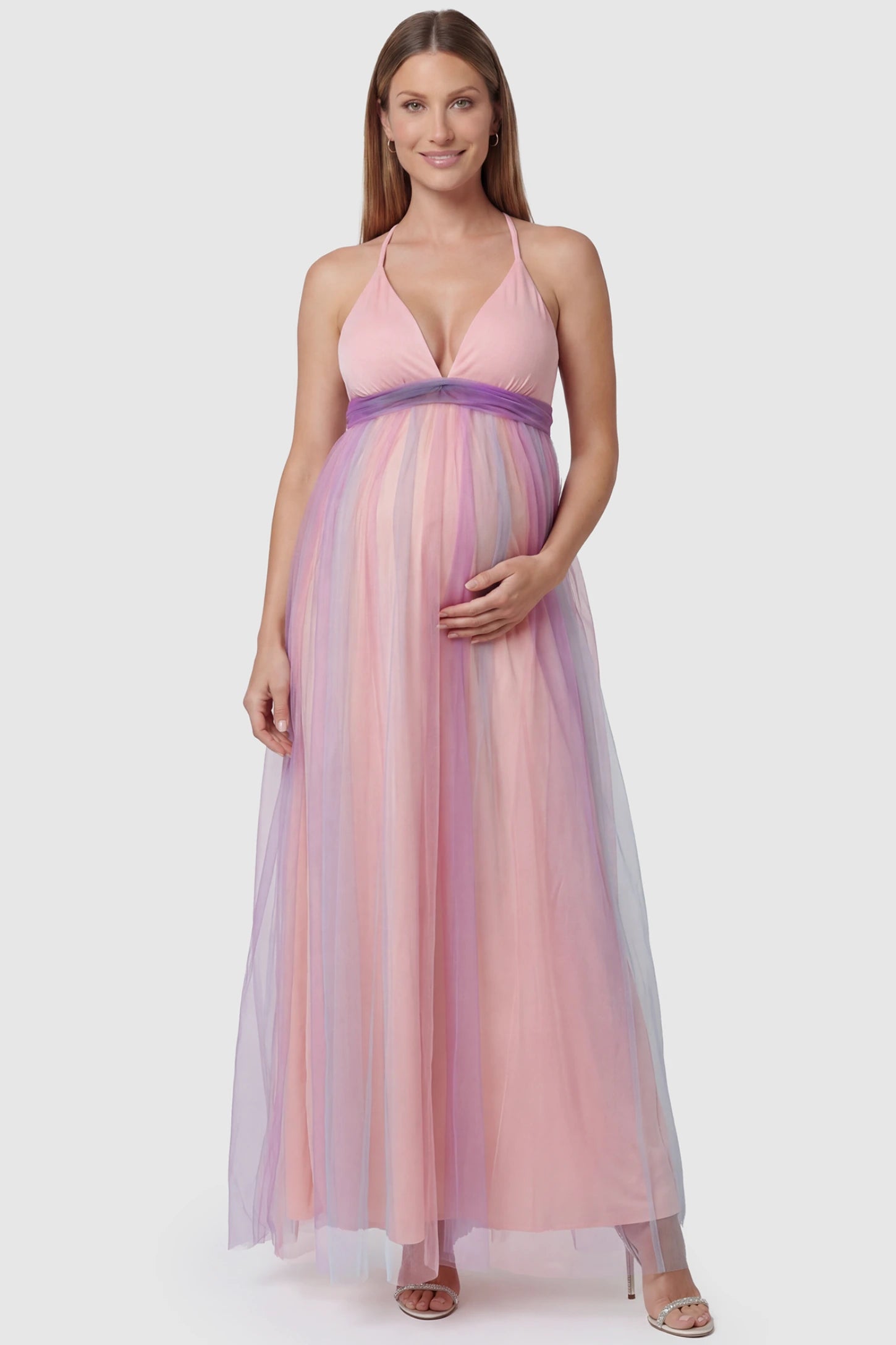 Rainbow Gradient Deep V-Neck Maternity Dress Rainbow Gradient Deep V-Neck Maternity Dress in gradient tulle featuring crossover bodice and empire waist on a pregnant model. front view