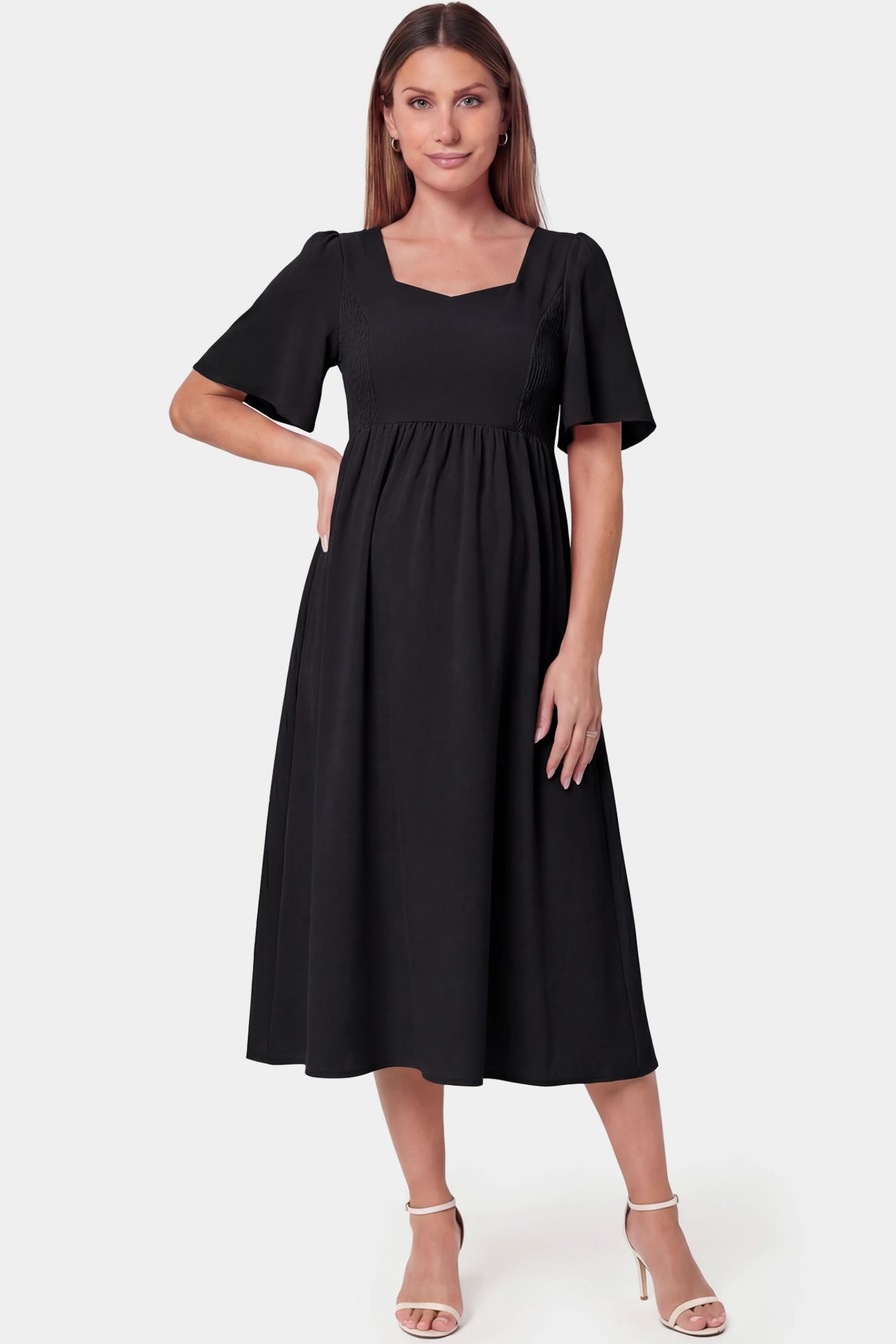 Square Neck Short Sleeve Large Swing Midi Maternity Dress Square neck short sleeve large swing midi maternity dress in black featuring refined square neckline in front view on a pregnant model