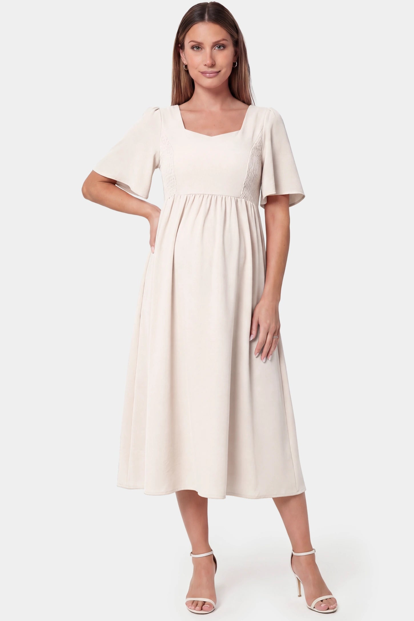 Square Neck Short Sleeve Large Swing Midi Maternity Dress Square neck short sleeve large swing midi maternity dress in ivory white featuring refined square neckline in front view on a pregnant model