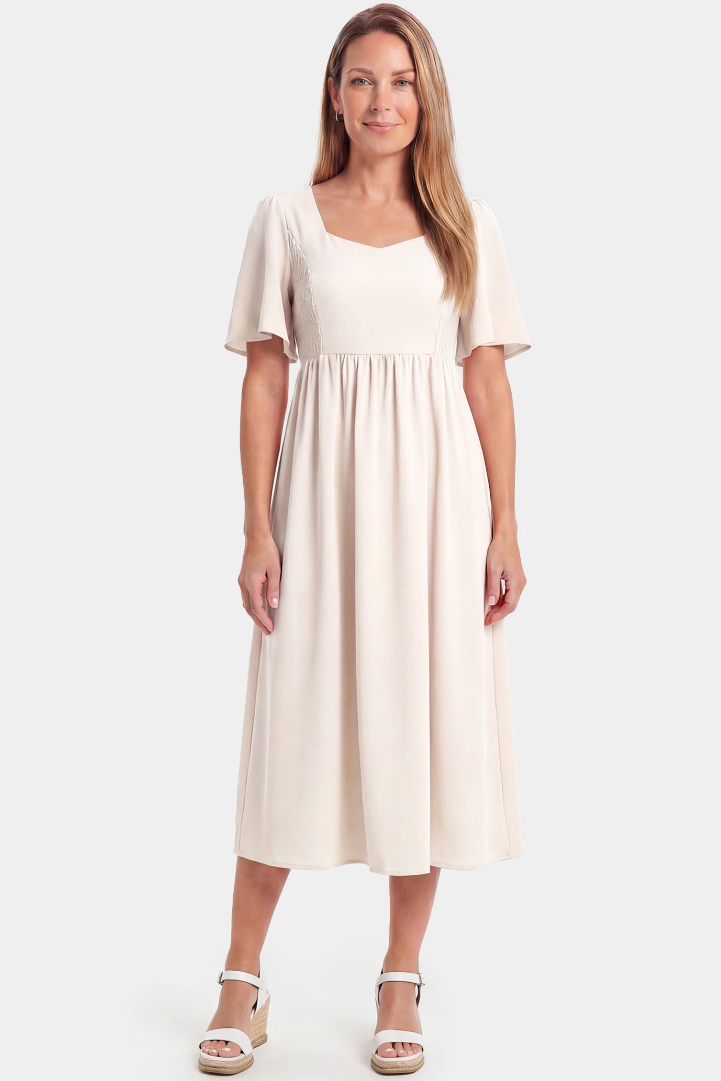 Square Neck Short Sleeve Large Swing Midi Maternity Dress Square neck short sleeve large swing midi maternity dress in ivory white featuring refined square neckline and short sleeves in front view on a postpartum model
