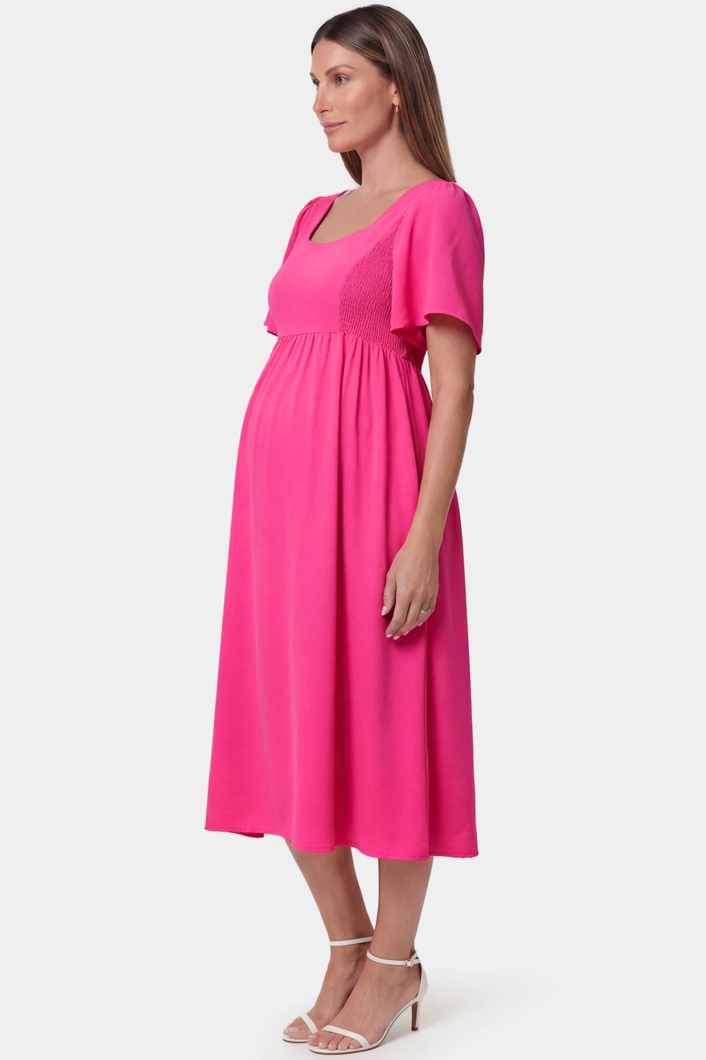 Square Neck Short Sleeve Large Swing Midi Maternity Dress Square neck short sleeve large swing midi maternity dress in rose red featuring extra-large swing skirt in side view on a pregnant model