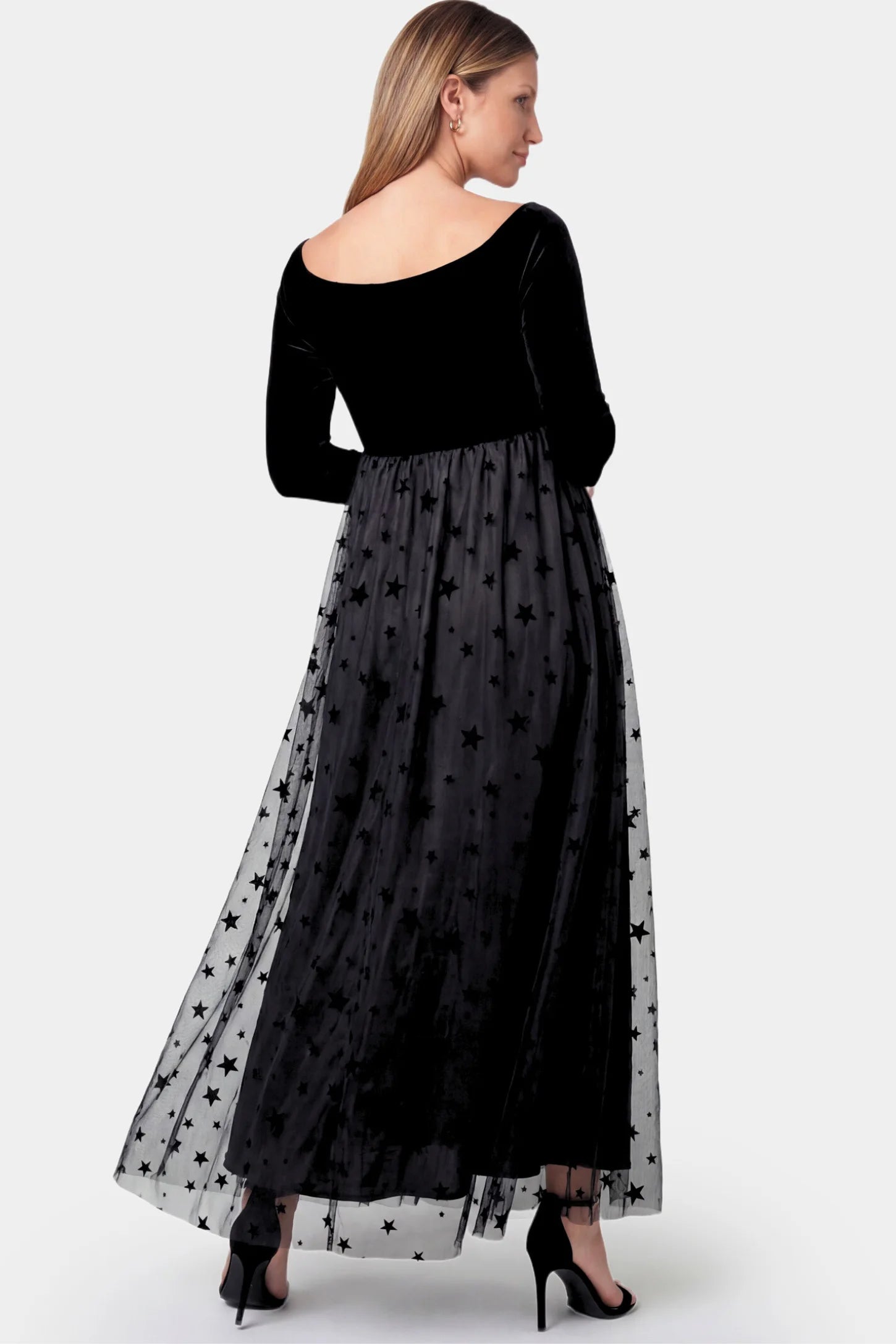 Stars Tulle Long Sleeve Maternity Gown Stars Tulle Long Sleeve Maternity Gown in black featuring velvet bodice and A-line tulle skirt on a pregnant model.