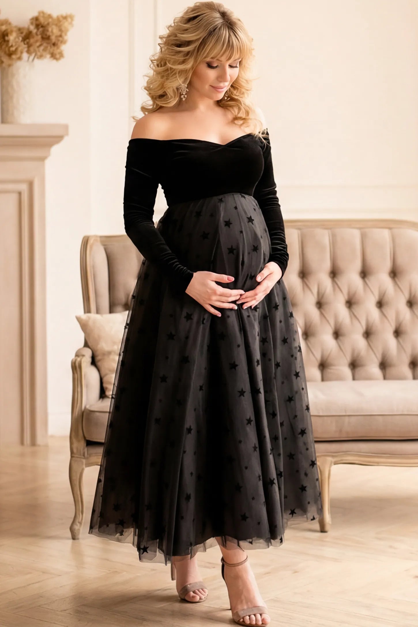 Stars Tulle Long Sleeve Maternity Gown in black featuring velvet bodice and A-line tulle skirt on a pregnant model.