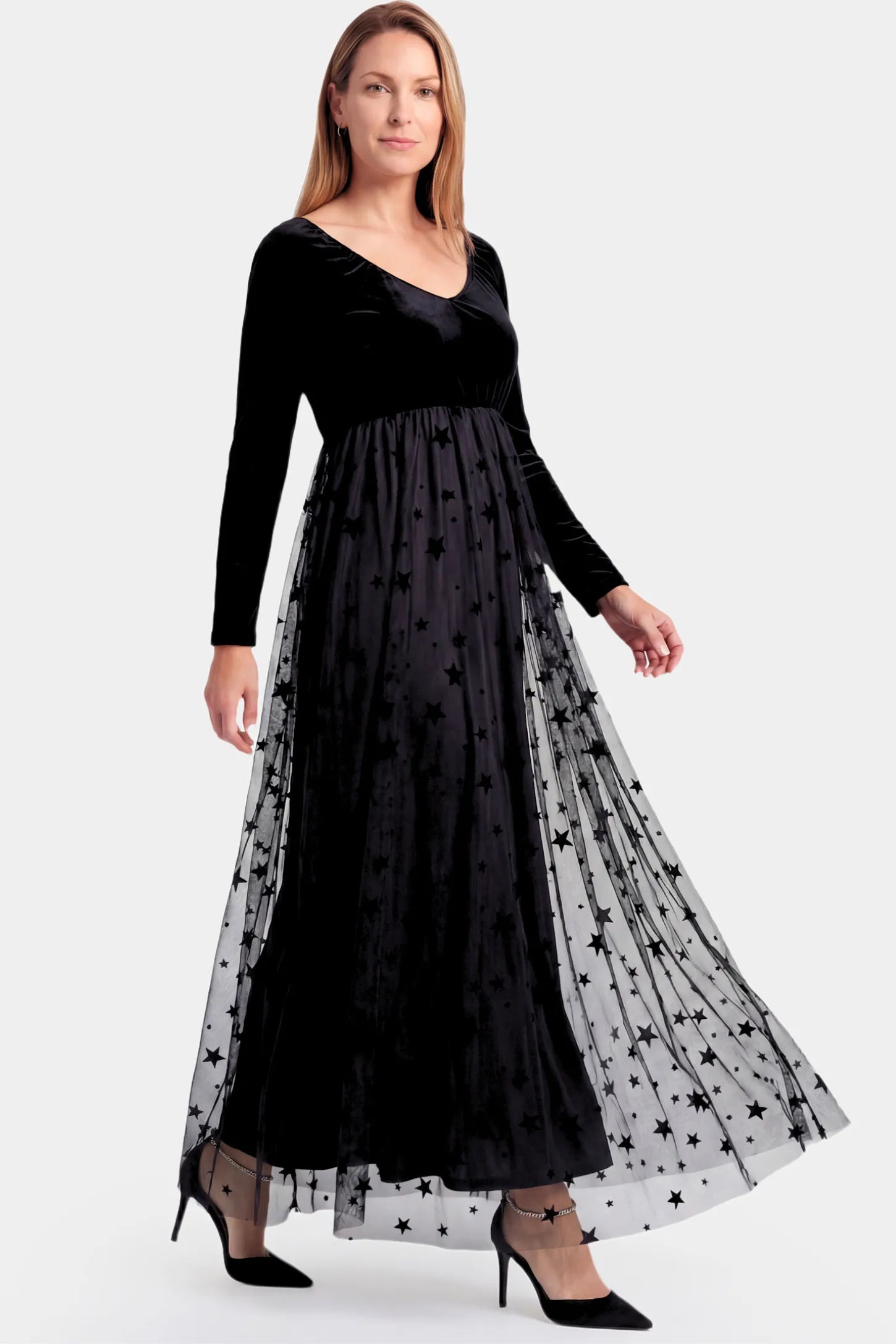Stars Tulle Long Sleeve Maternity Gown Stars Tulle Long Sleeve Maternity Gown in black featuring velvet bodice and A-line tulle skirt on a non pregnant model.