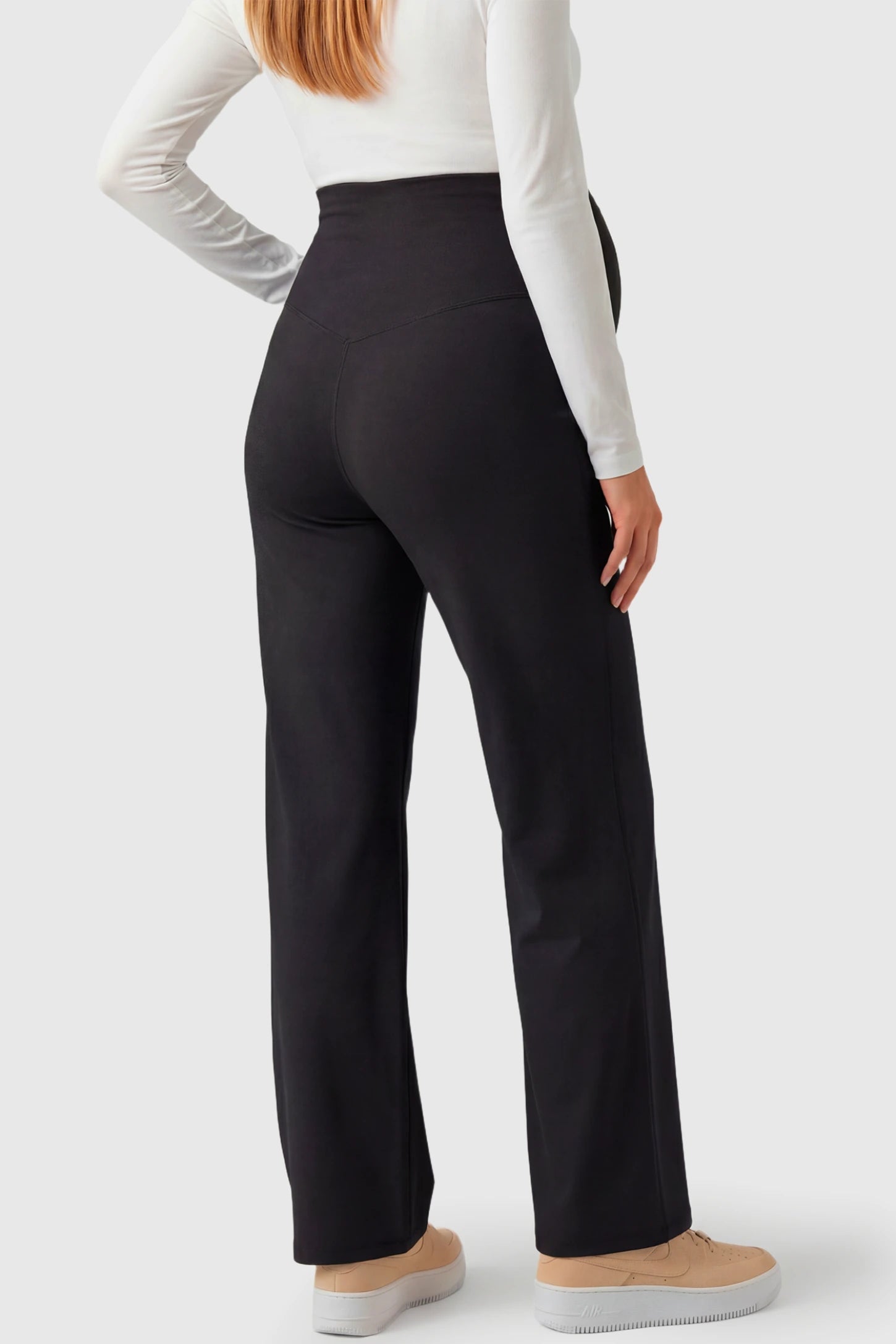 High-Waisted Straight-Leg Maternity Pants High Waisted Straight-Leg Maternity Pants in black featuring over-the-belly support and standard length fit on pregnant model.