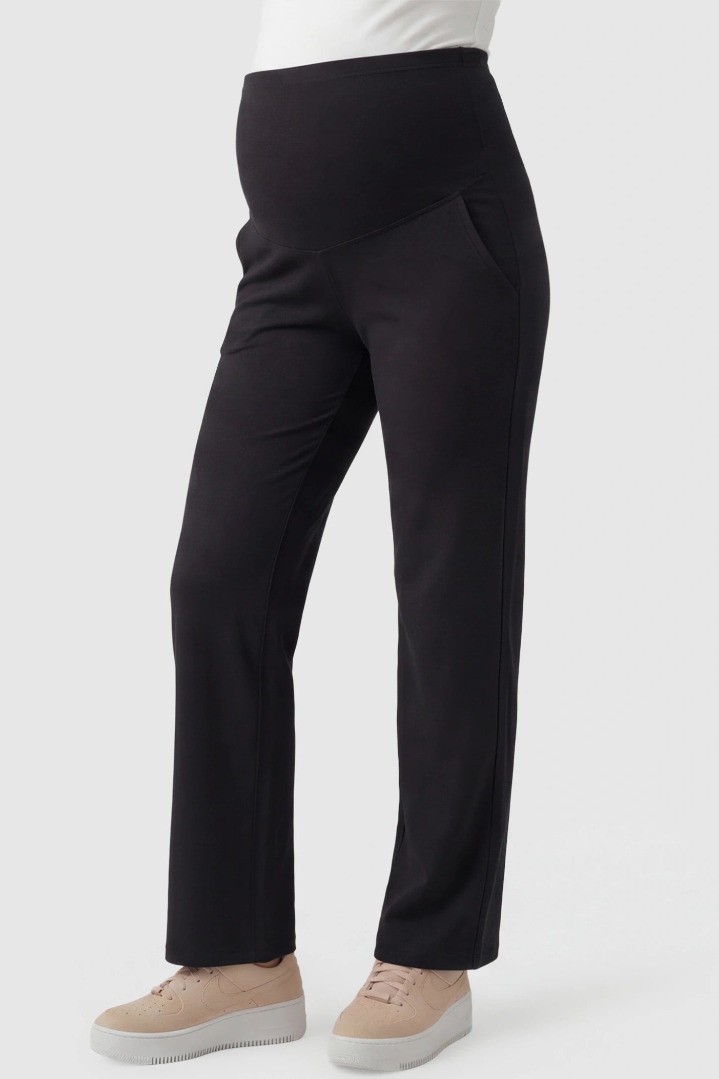 High-Waisted Straight-Leg Maternity Pants High Waisted Straight-Leg Maternity Pants in black featuring over-the-belly support and standard length fit on pregnant model front view.