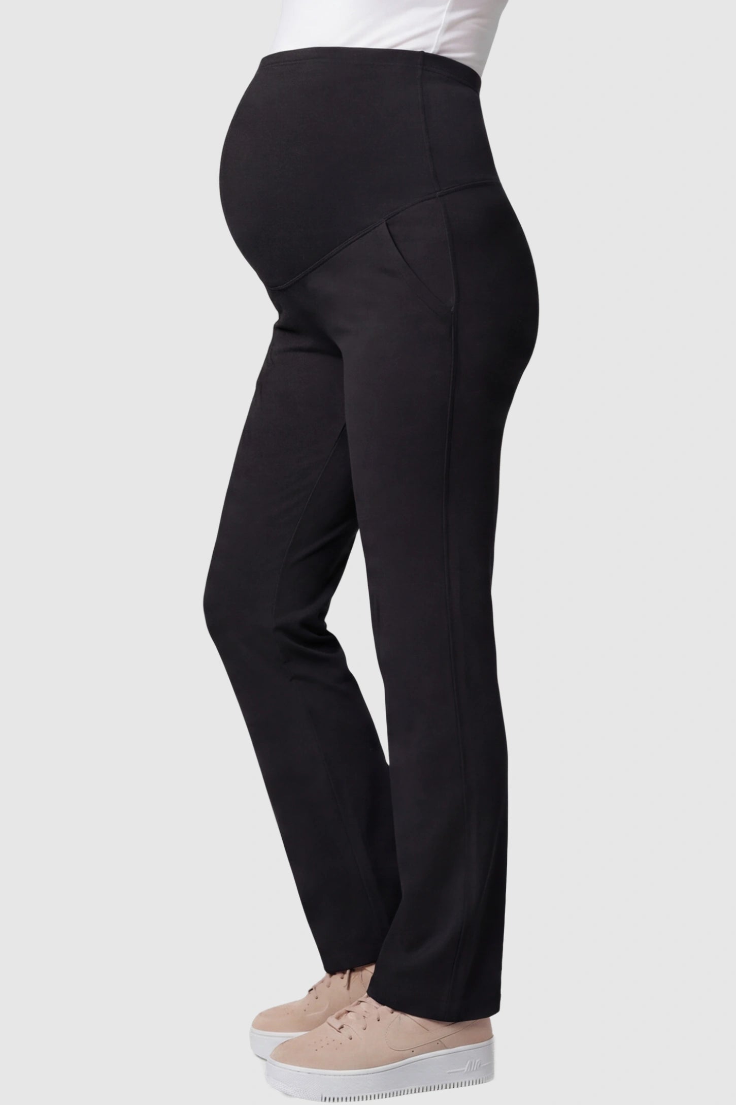 High-Waisted Straight-Leg Maternity Pants High Waisted Straight-Leg Maternity Pants in black featuring over-the-belly support and standard length fit on pregnant model side view.