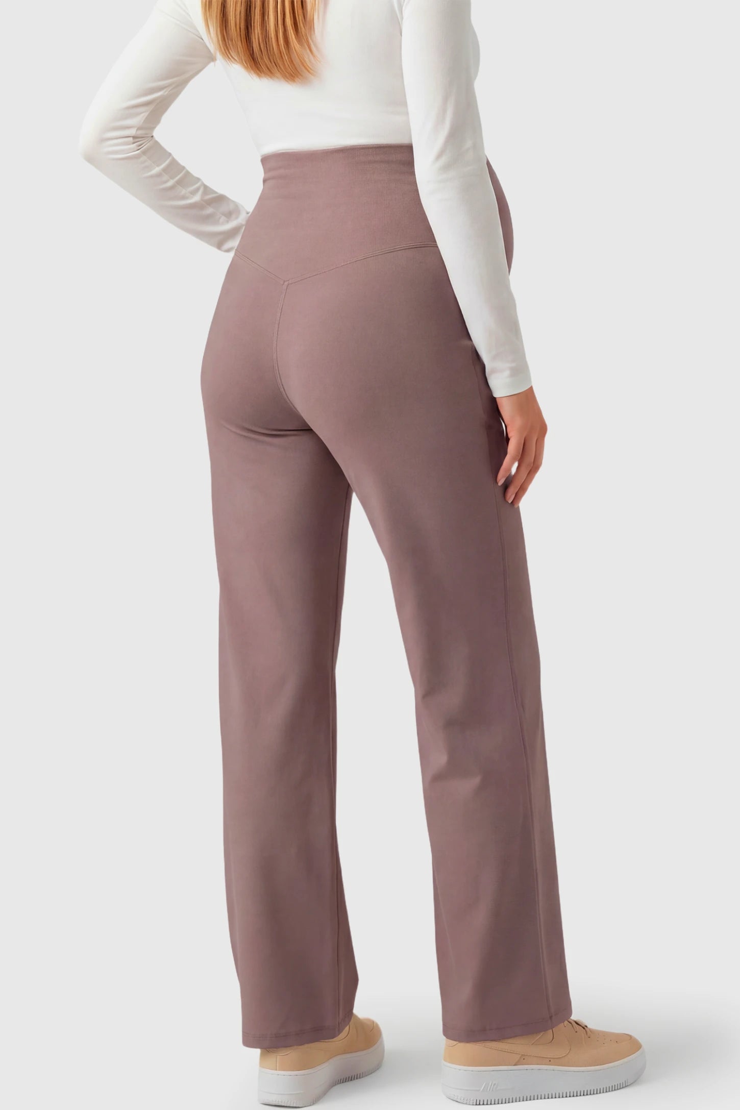 High-Waisted Straight-Leg Maternity Pants High Waisted Straight-Leg Maternity Pants in brown featuring over-the-belly support and standard length fit on pregnant model.