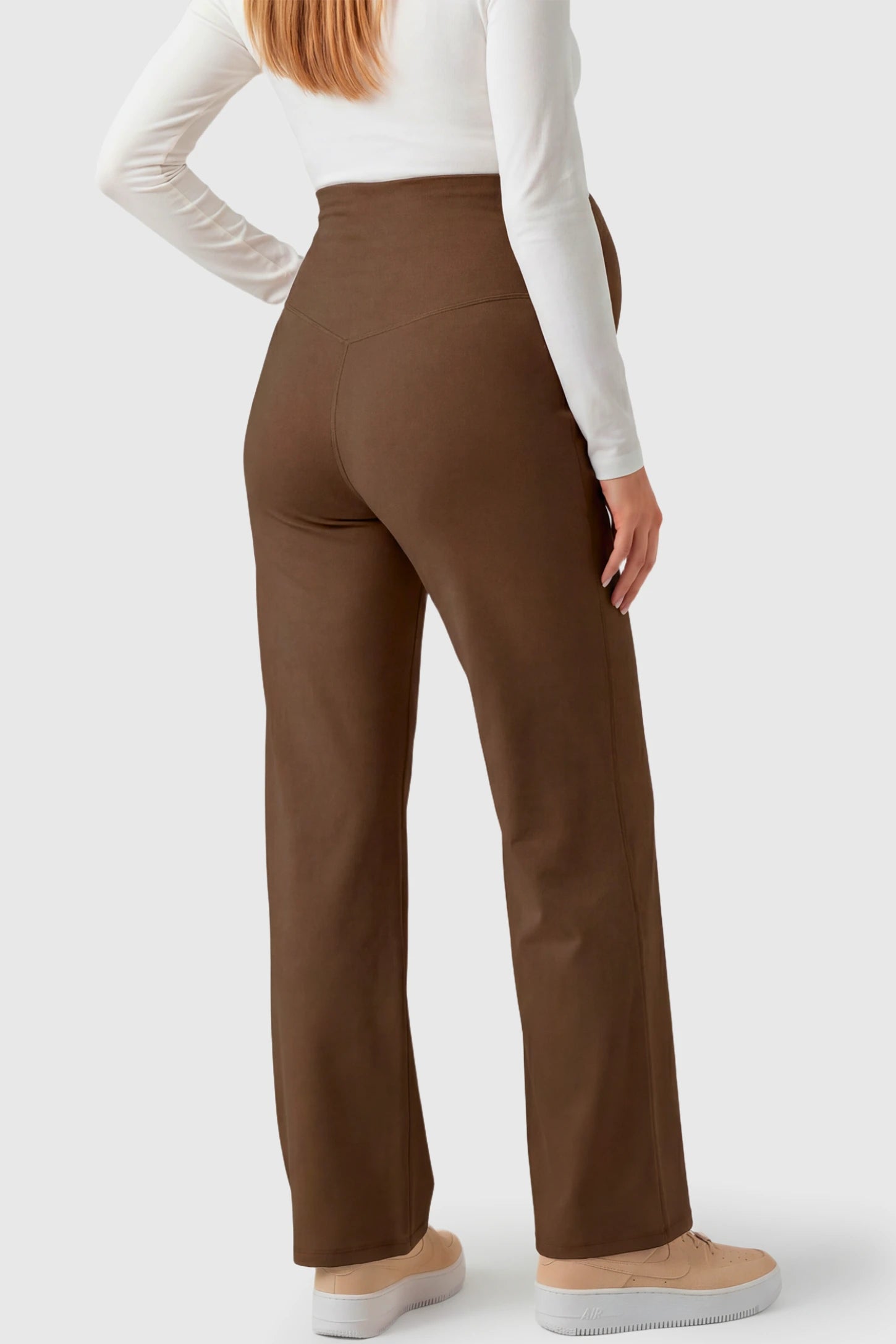 High-Waisted Straight-Leg Maternity Pants High Waisted Straight-Leg Maternity Pants in coffee brown featuring over-the-belly support and standard length fit on pregnant model.