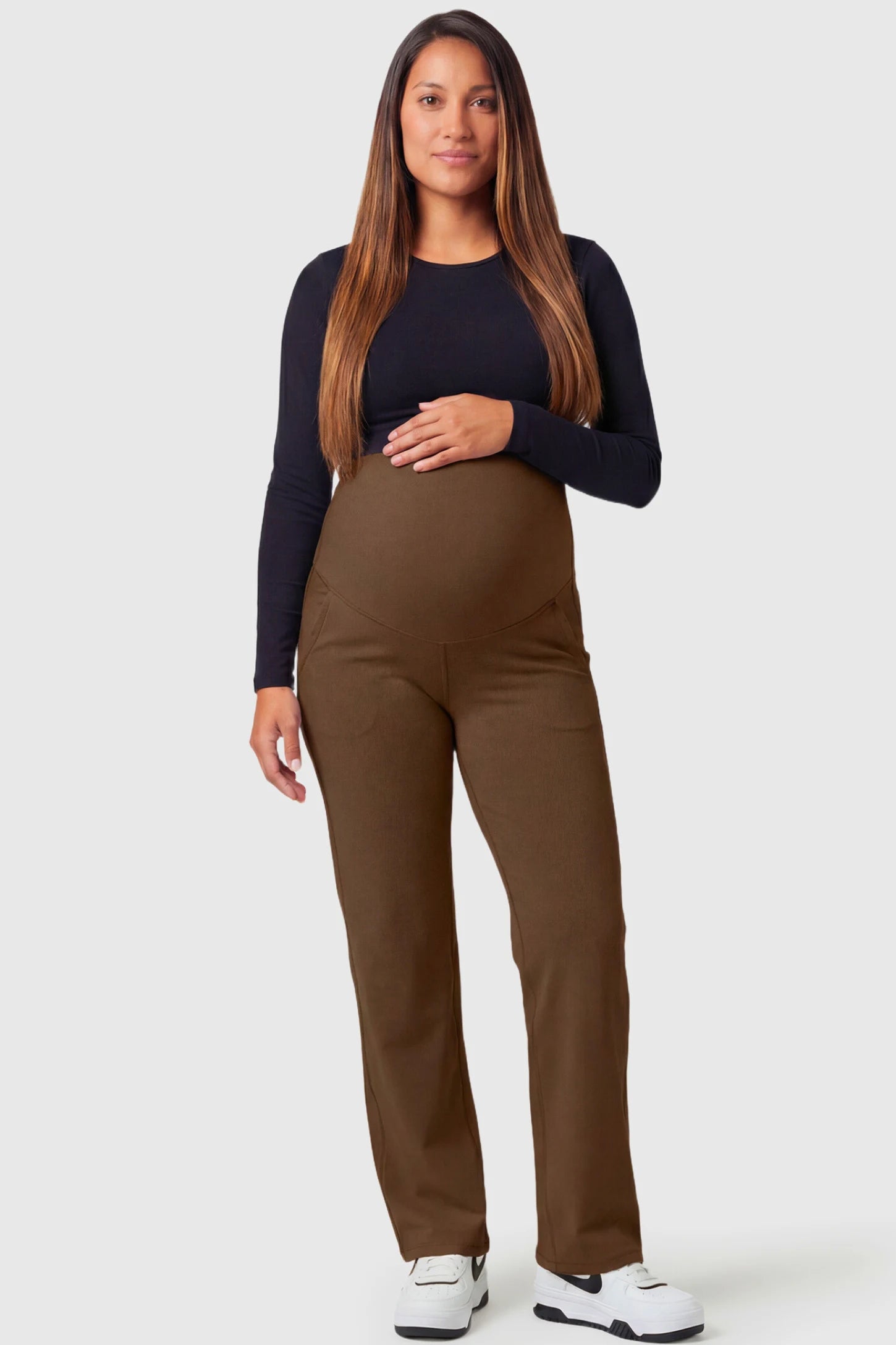 High-Waisted Straight-Leg Maternity Pants High Waisted Straight-Leg Maternity Pants in coffee brown featuring over-the-belly support and standard length fit on pregnant model.