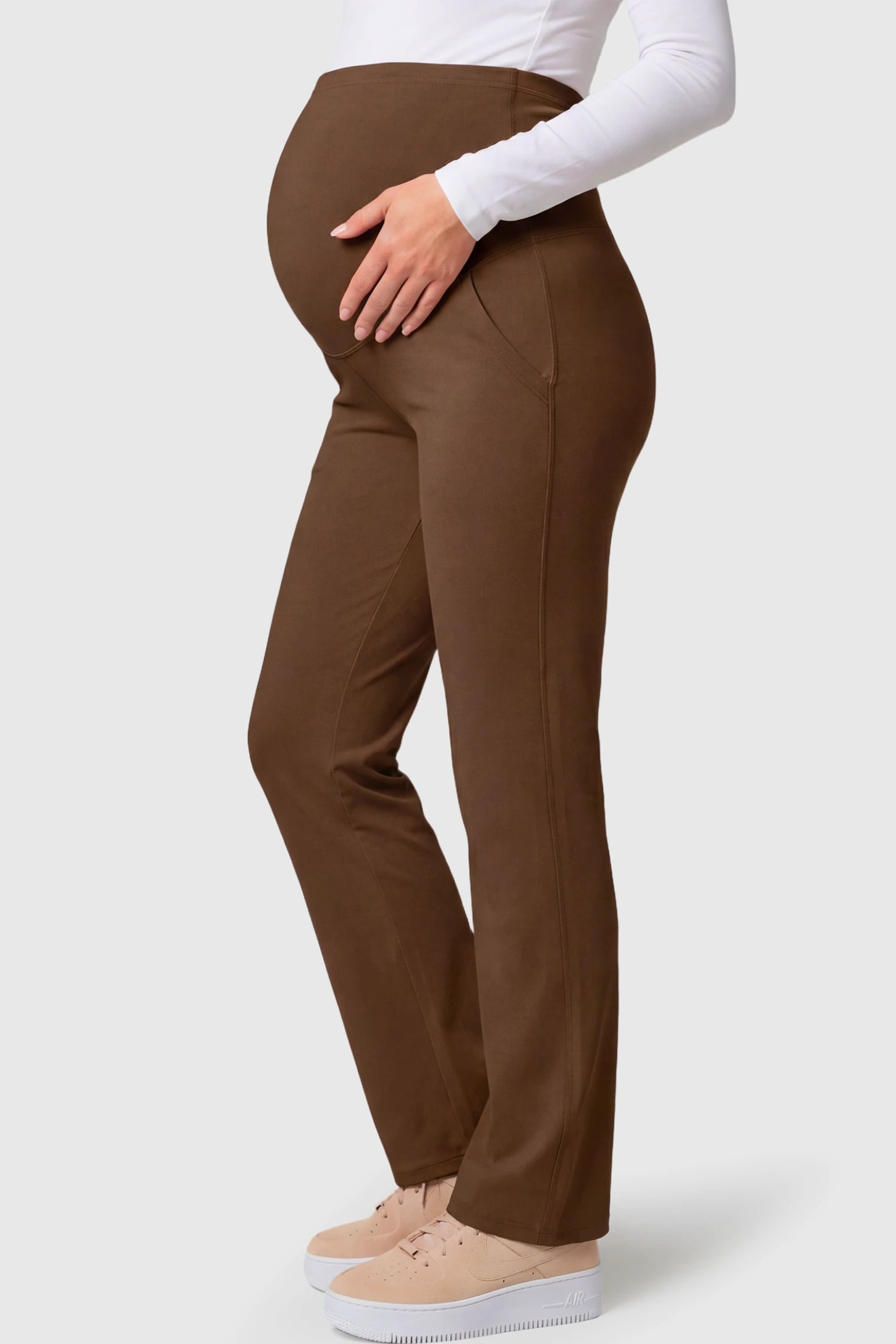 High-Waisted Straight-Leg Maternity Pants High Waisted Straight-Leg Maternity Pants in coffee brown featuring over-the-belly support and standard length fit on pregnant model.