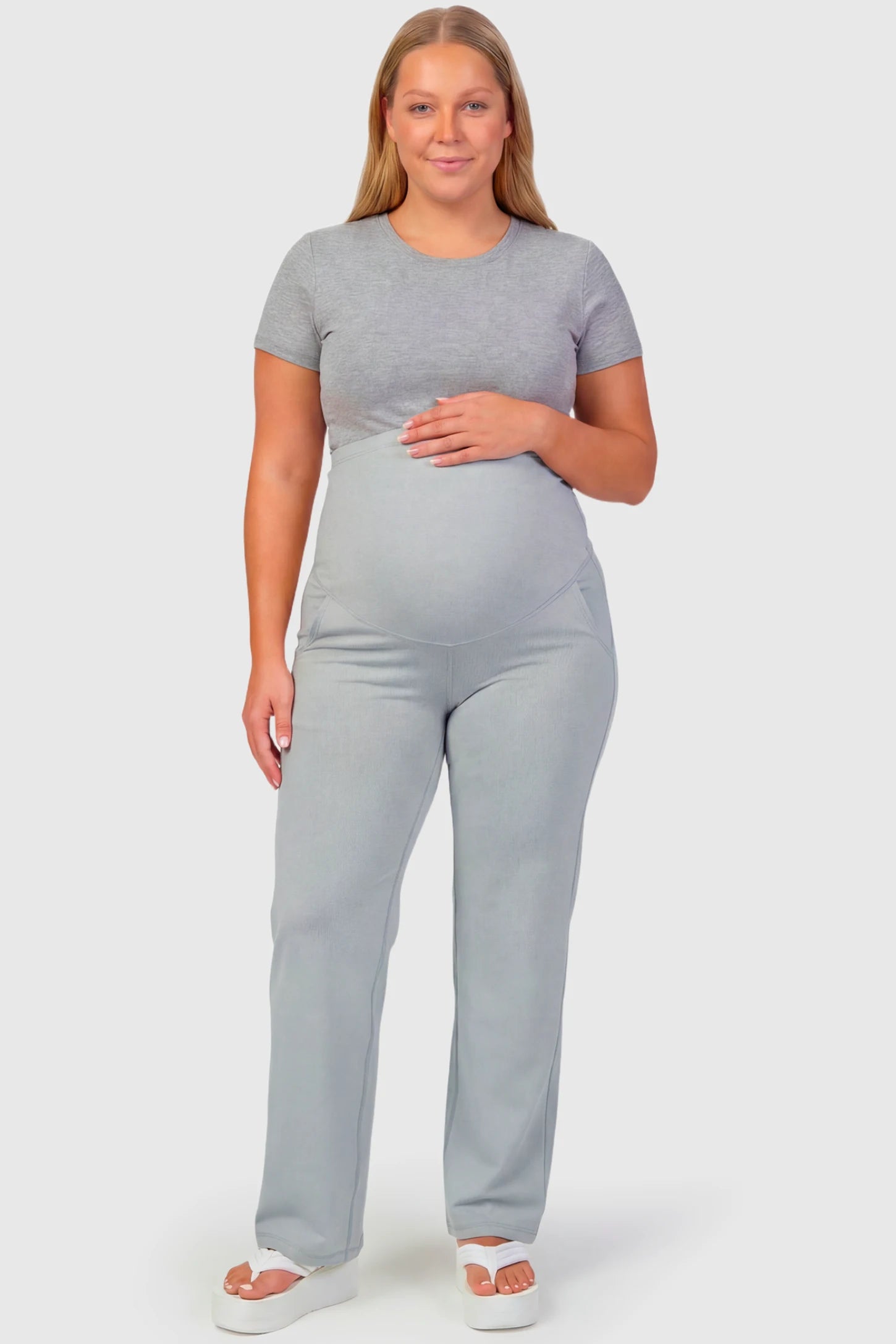 High-Waisted Straight-Leg Maternity Pants High Waisted Straight-Leg Maternity Pants in grandma gray featuring over-the-belly support and standard length fit on plus size pregnant model.
