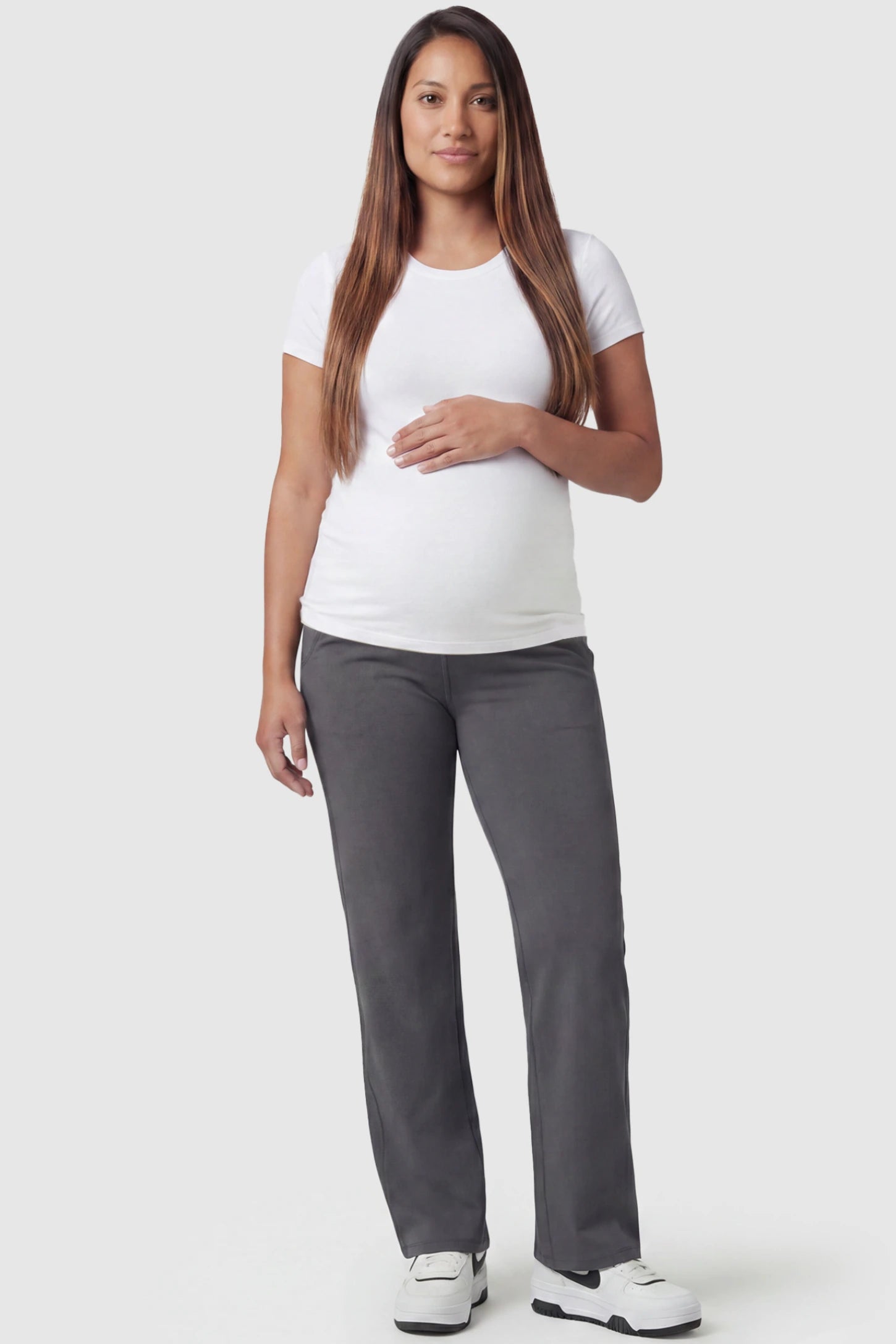 High-Waisted Straight-Leg Maternity Pants High Waisted Straight-Leg Maternity Pants in gray featuring over-the-belly support and standard length fit on pregnant model, full body view.