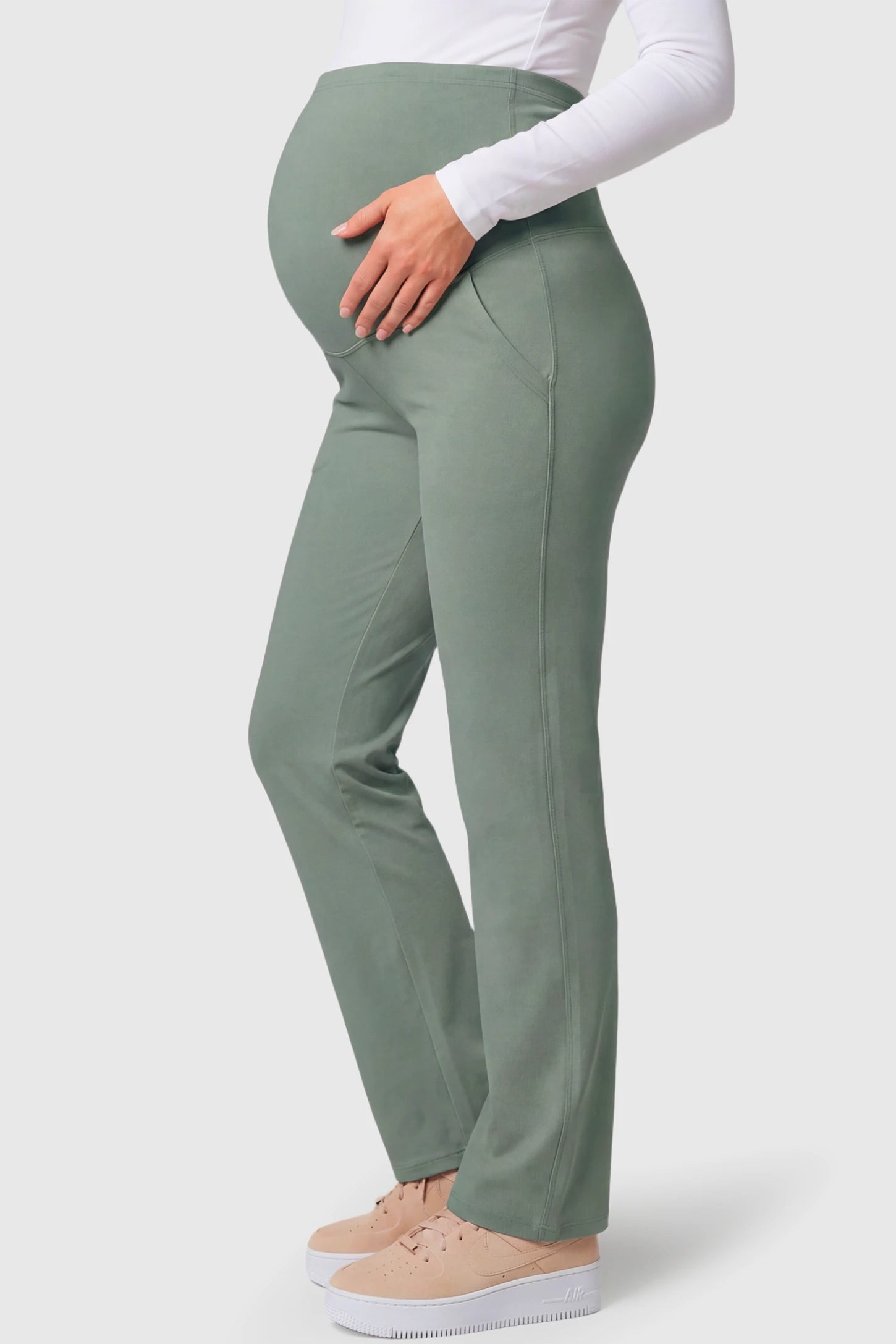 High-Waisted Straight-Leg Maternity Pants High Waisted Straight-Leg Maternity Pants in grayish green featuring over-the-belly support and standard length fit on pregnant model.