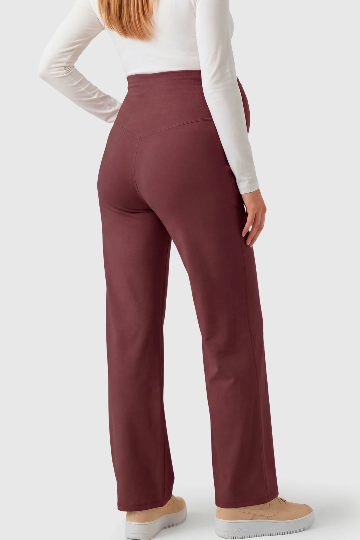 High-Waisted Straight-Leg Maternity Pants High Waisted Straight-Leg Maternity Pants in wine red featuring over-the-belly support and standard length fit on pregnant model.