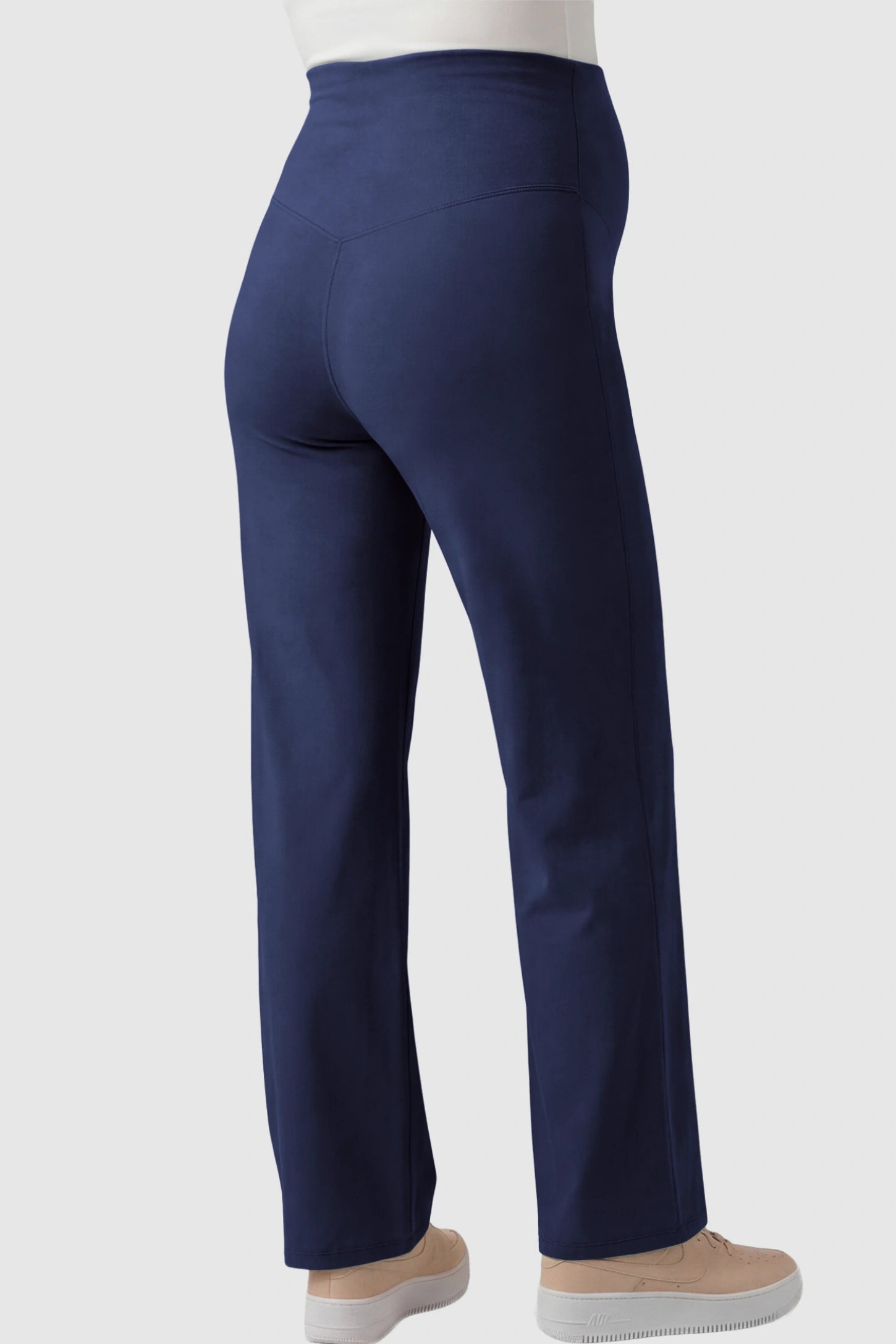 High-Waisted Straight-Leg Maternity Pants High Waisted Straight-Leg Maternity Pants in navy blue featuring over-the-belly support and standard length fit on pregnant model back view.
