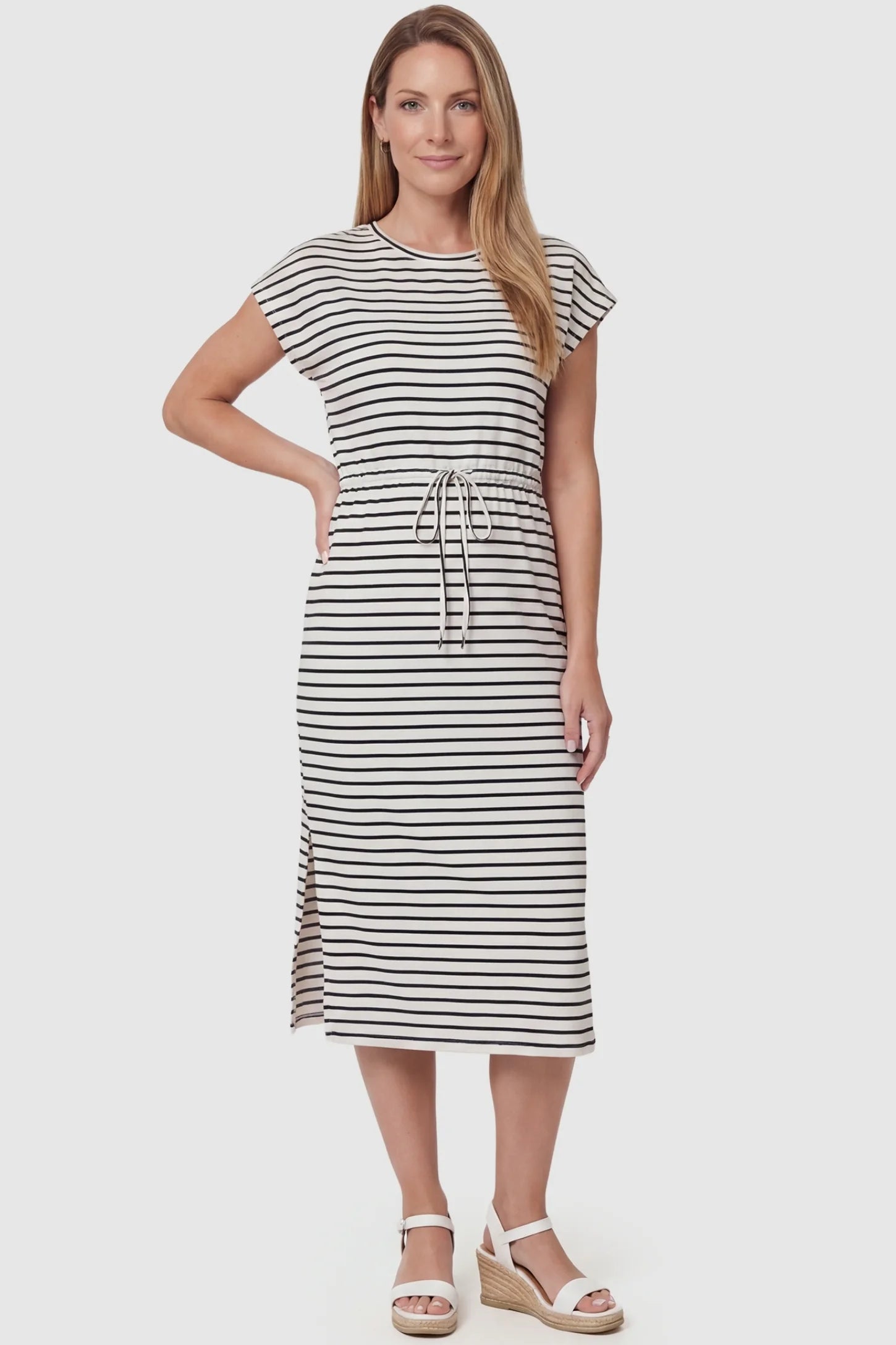 Striped Batwing Sleeve Maternity Dress Striped Batwing Sleeve Maternity Dress in black and white stripes featuring a crew neck on a front-facing non-pregnant model.