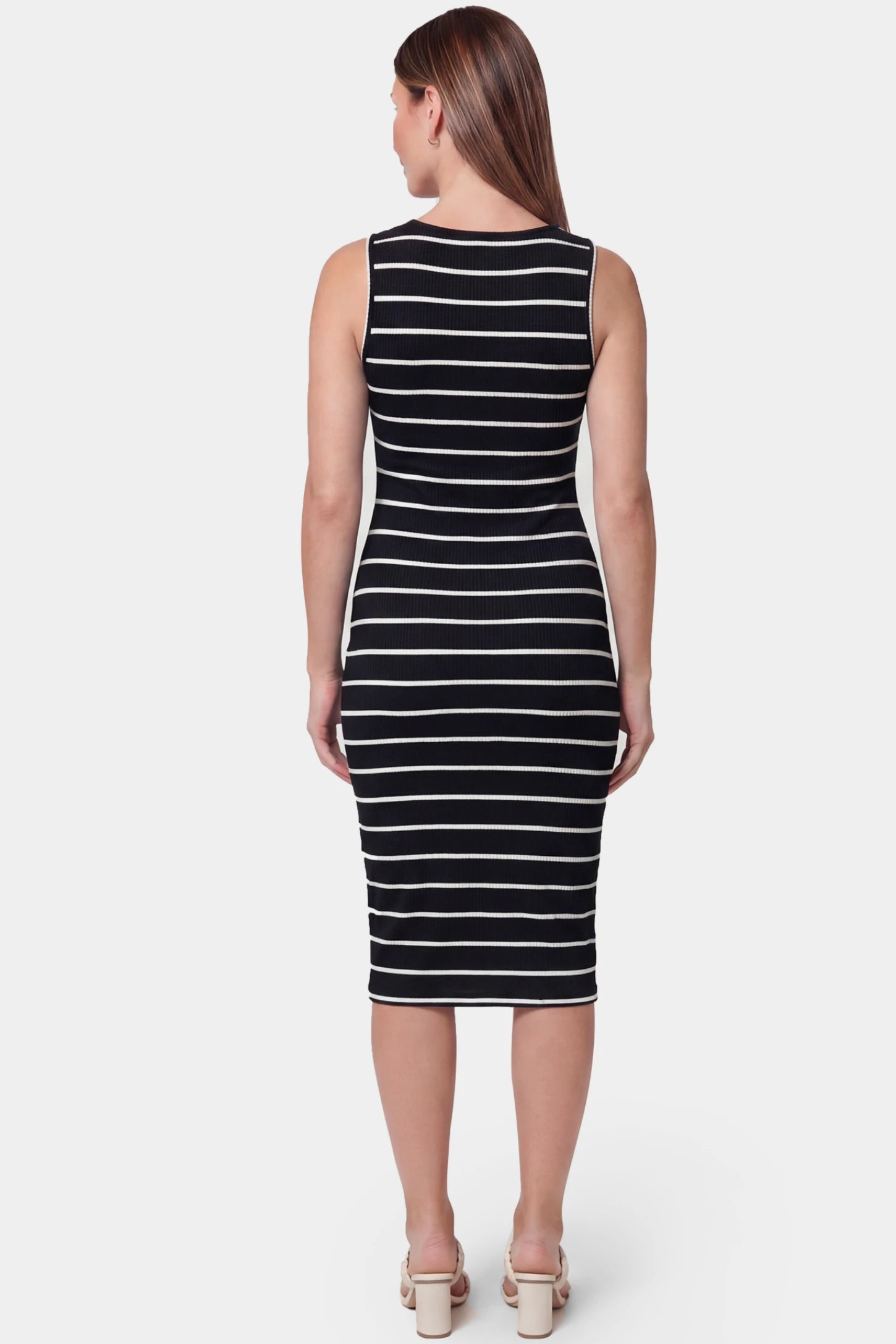 Striped Sleeveless Crew Neck Midi Maternity Dress Striped sleeveless crew neck midi maternity dress in black featuring flowing fit in back view on a pregnant model