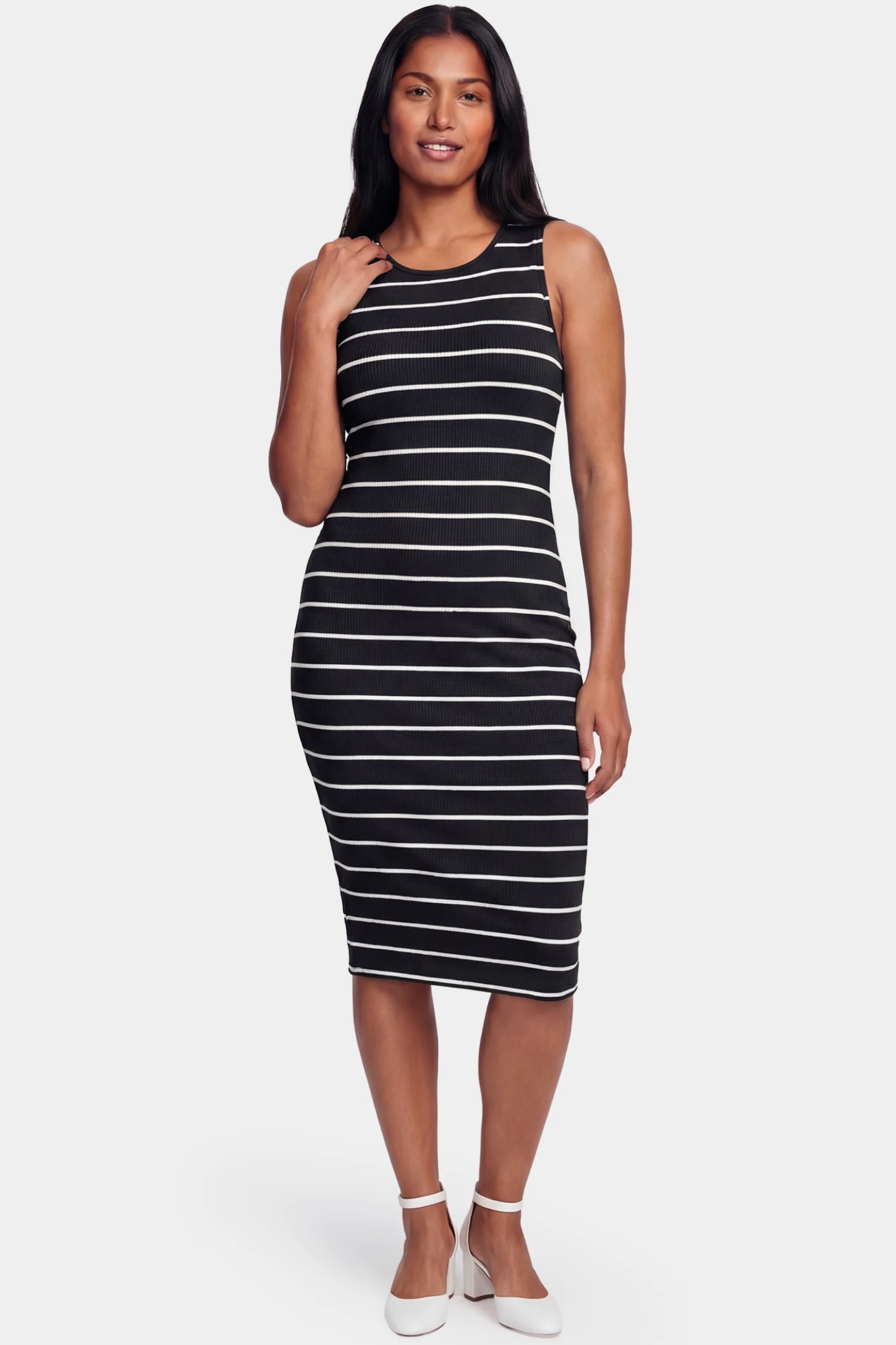 Striped Sleeveless Crew Neck Midi Maternity Dress Striped sleeveless crew neck midi maternity dress in black featuring classic stripe pattern in front view on a postpartum model