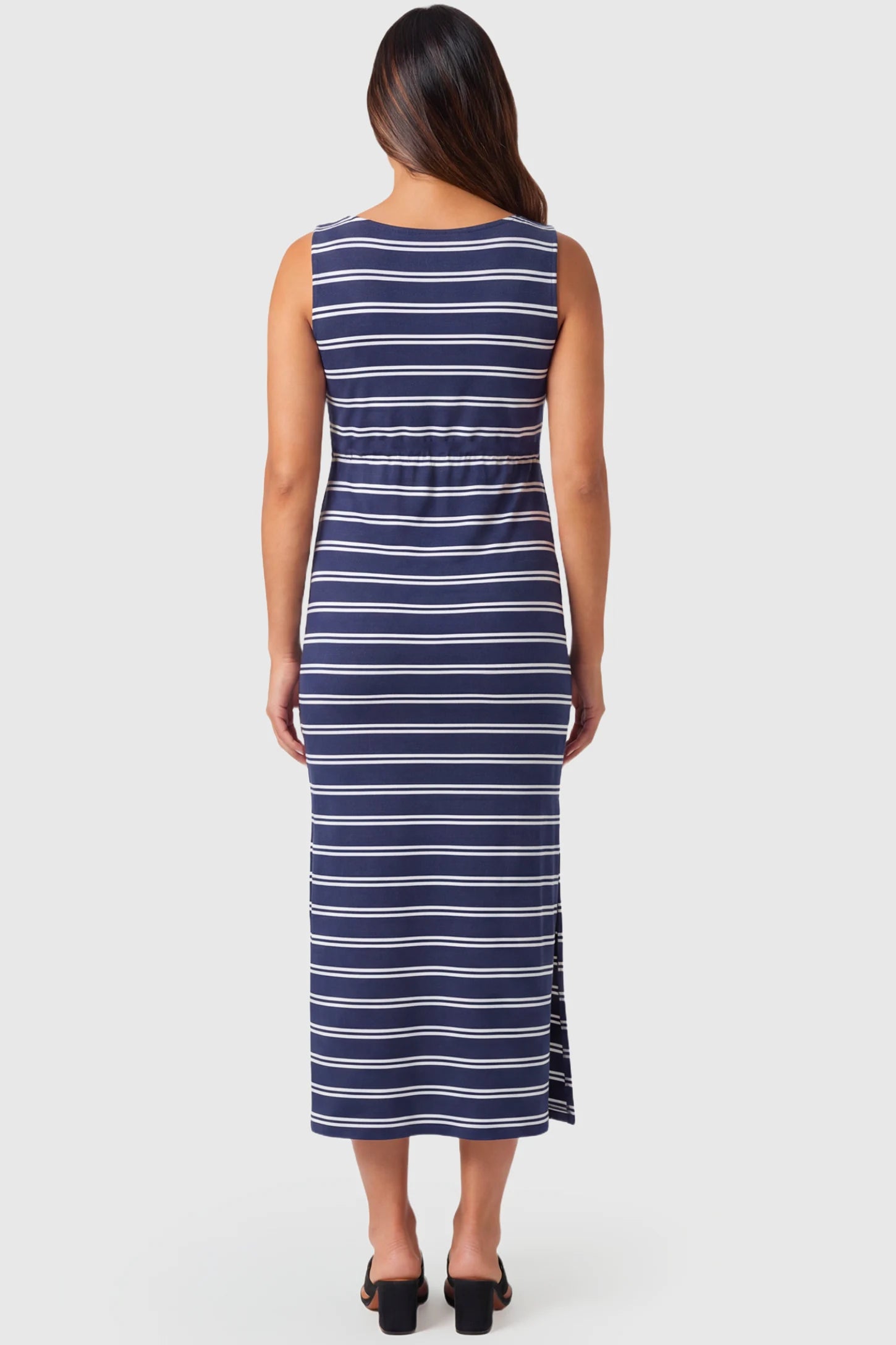 Sleeveless Scoop Neck Maternity & Nursing Midi Dress Sleeveless Scoop Neck Maternity & Nursing Midi Dress in navy stripe pattern featuring a side slit on a pregnant model.