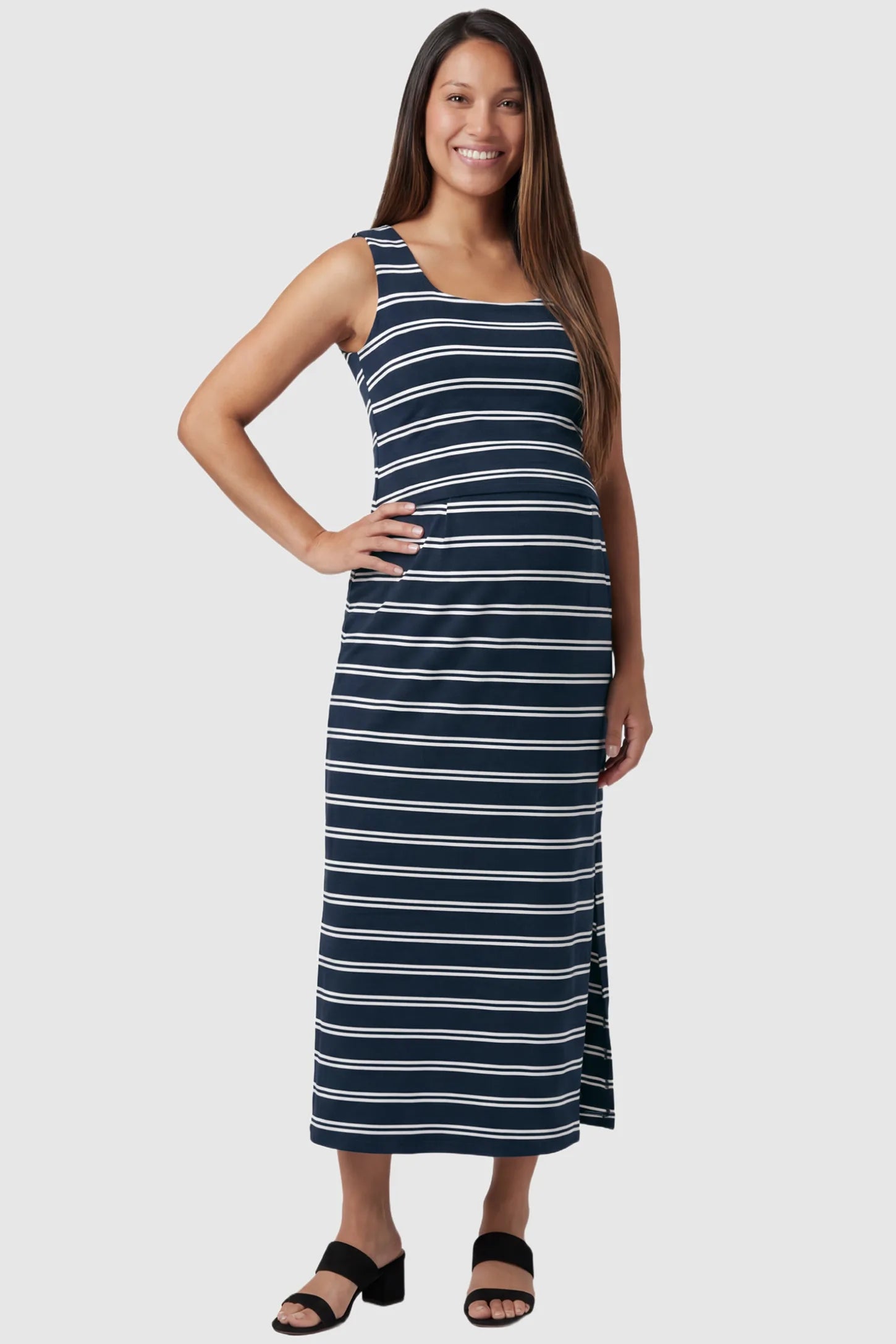 Sleeveless scoop neck maternity & nursing midi dress in dark blue stripes with soft scoop neckline, front view on pregnant model