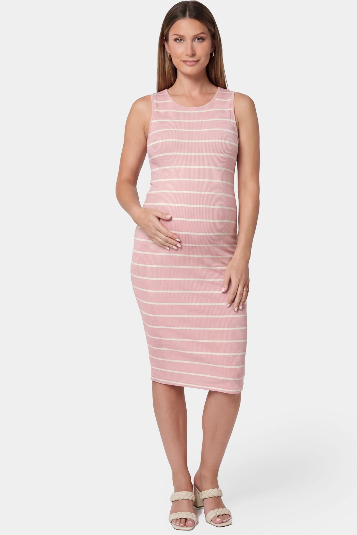 Striped Sleeveless Crew Neck Midi Maternity Dress Striped sleeveless crew neck midi maternity dress in pink featuring classic stripe pattern in front view on a pregnant model