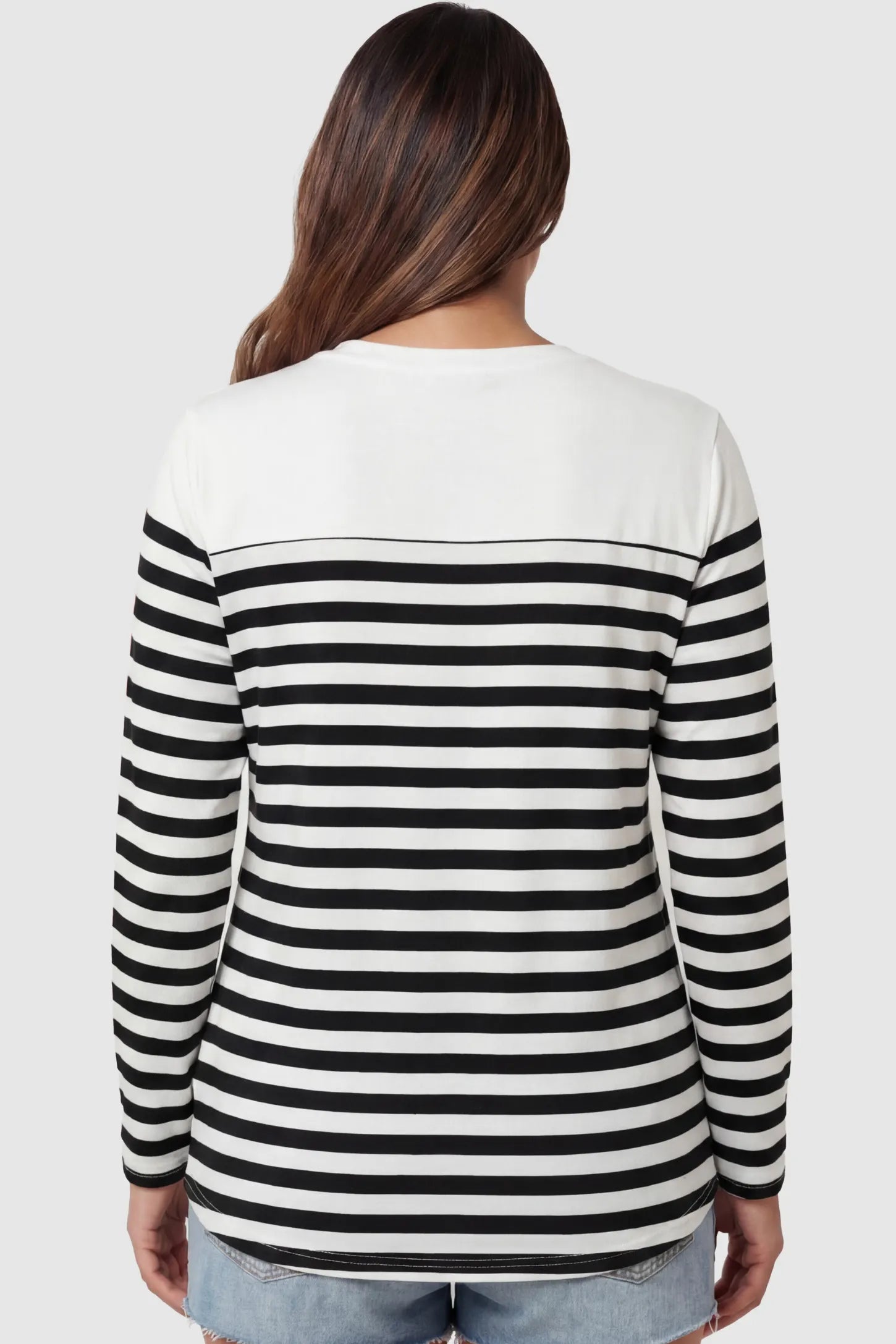 Striped Crew Neck Long Sleeve Maternity Top Striped Crew Neck Long Sleeve Maternity Top in black featuring a crew neck and heart detail on a pregnant model.