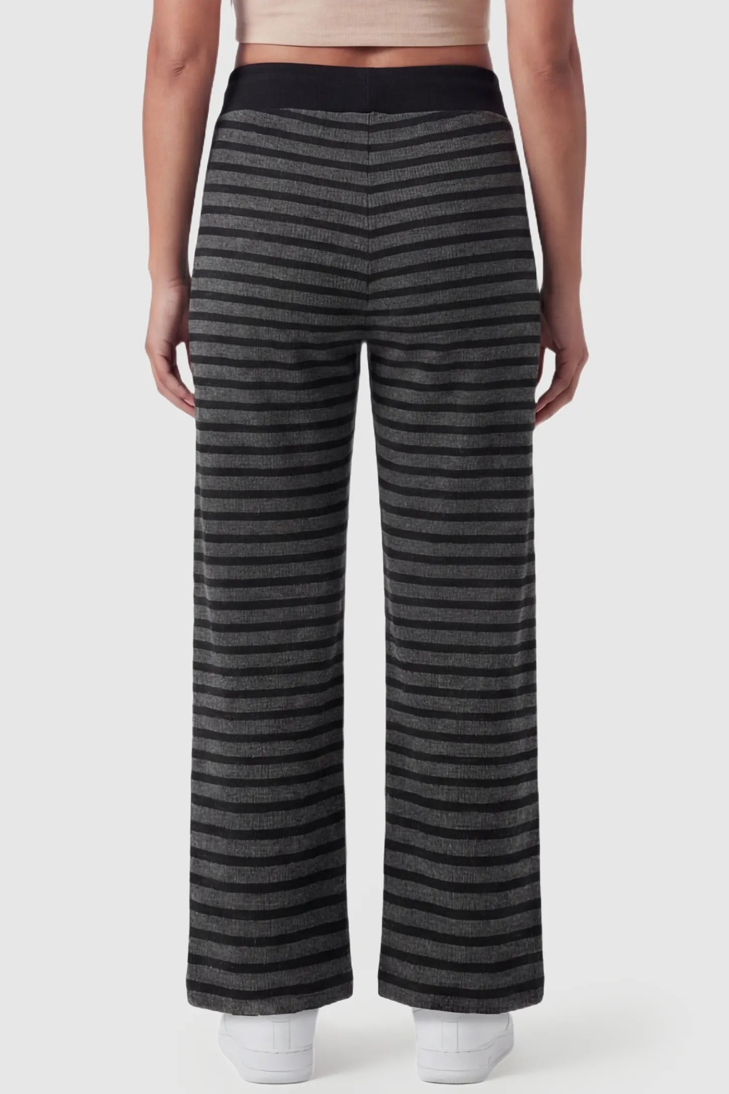 Striped Knit Drawstring Wide-Leg Maternity Pants Striped Knit Drawstring Wide-Leg Maternity Pants in dark gray stripes featuring a high-waisted fit on a pregnant model, back view.