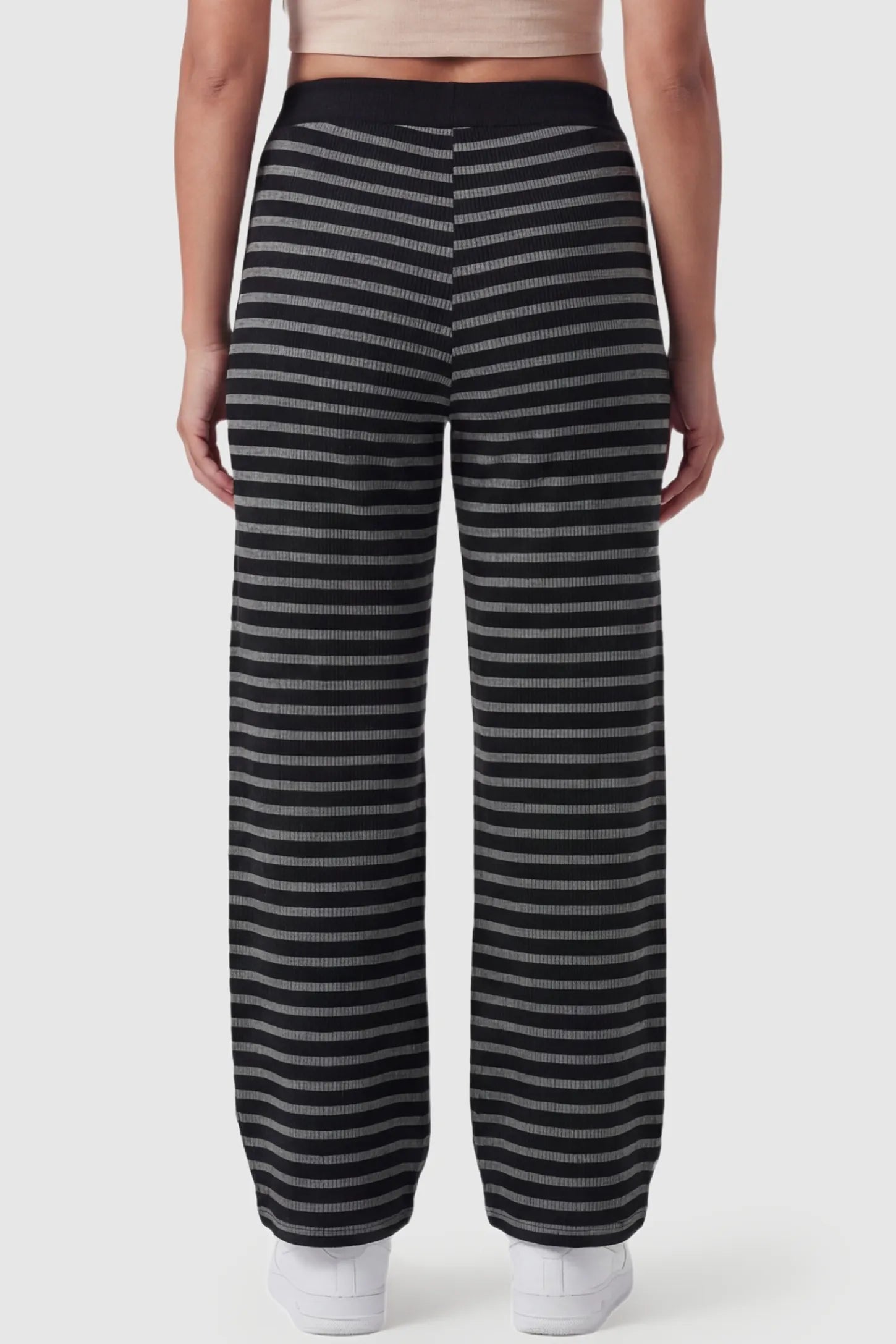 Striped Knit Drawstring Wide-Leg Maternity Pants Striped Knit Drawstring Wide-Leg Maternity Pants in black stripes featuring a slimming linear pattern on a postpartum model, back view.