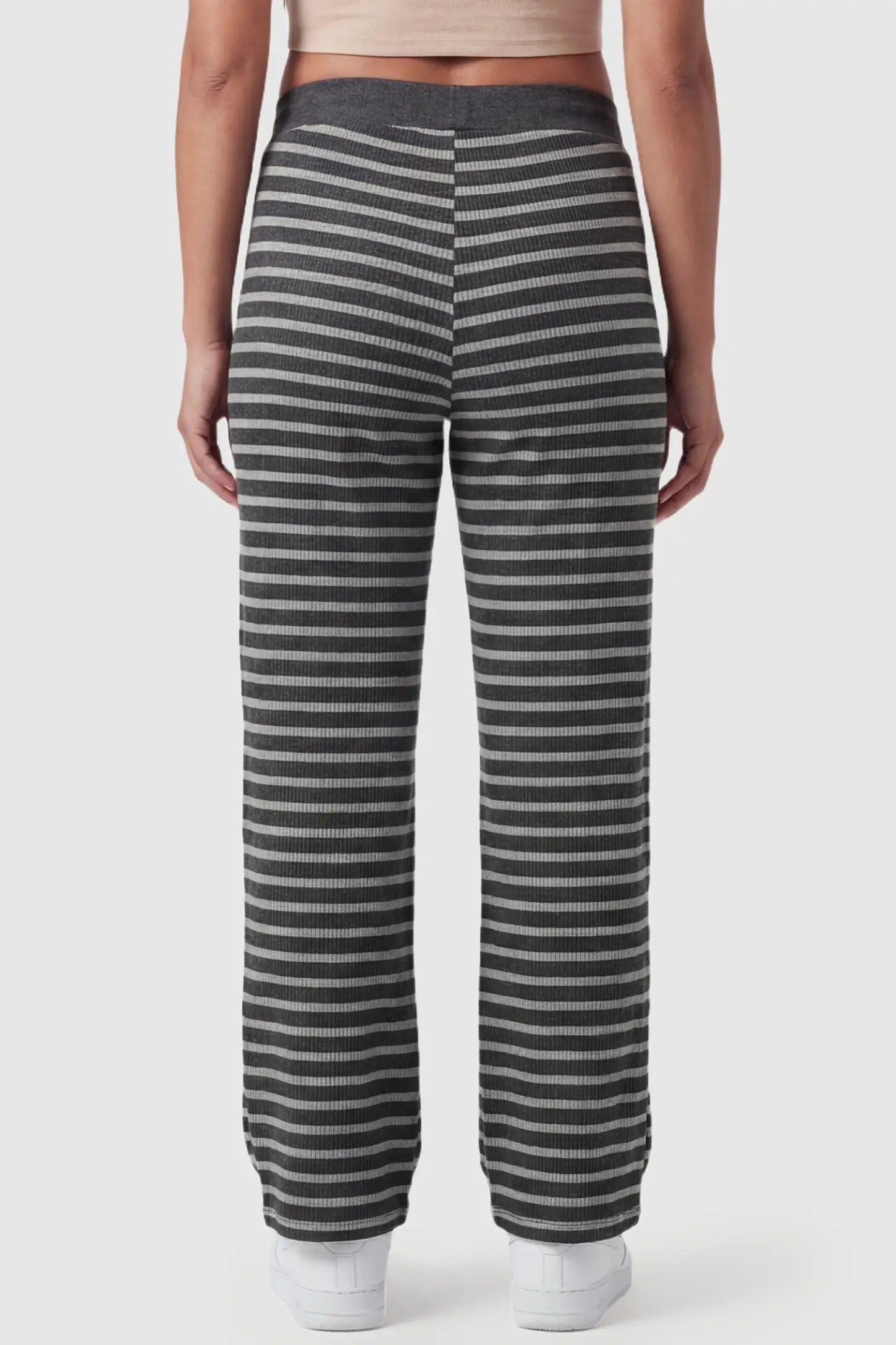 Striped Knit Drawstring Wide-Leg Maternity Pants Striped Knit Drawstring Wide-Leg Maternity Pants in light stripes featuring a slimming vertical design on a pregnant model, back view.