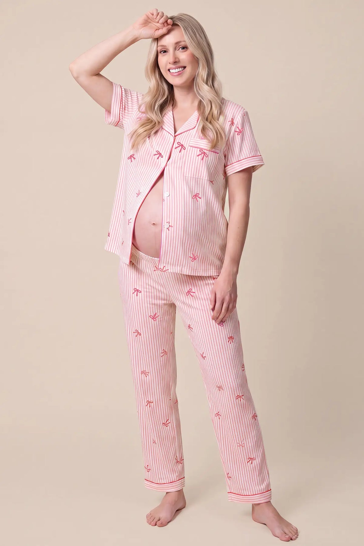 Sweet Ribbon Stripe Cotton Maternity PJ Set with Shorts & Pants Sweet Ribbon Stripe Cotton Maternity Pajama Set with Shorts & Pants in Pink Striped Bow featuring matching pajama pants, ribbon bow print, breathable fabric, and a comfortable loose fit on a pregnant model, full body view.