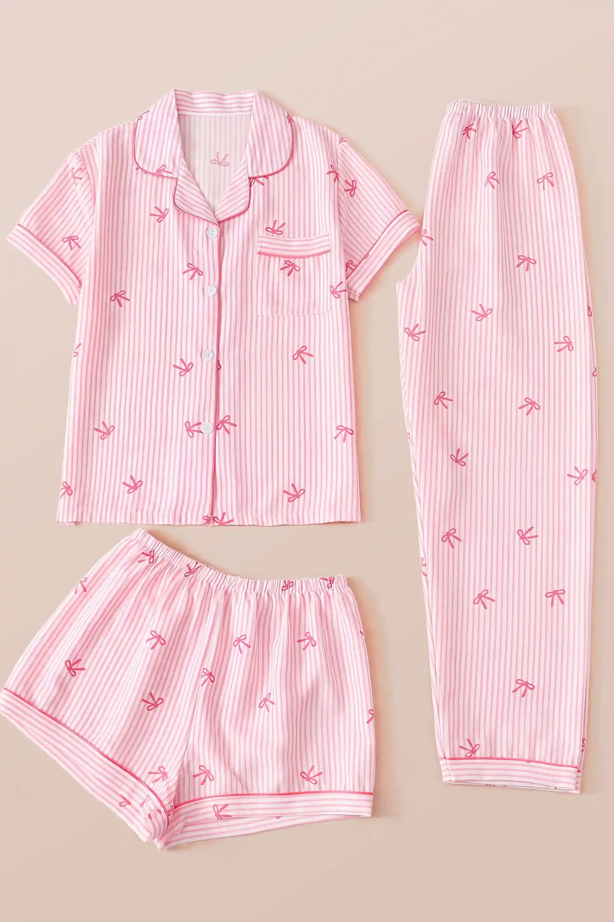 Sweet Ribbon Stripe Cotton Maternity PJ Set with Shorts & Pants Sweet Ribbon Stripe Cotton Maternity Pajama Set with Shorts & Pants in Pink Striped Bow featuring a matching short sleeve pajama top, shorts, pants, ribbon bow print, and lightweight breathable fabric displayed in a flat lay view.
