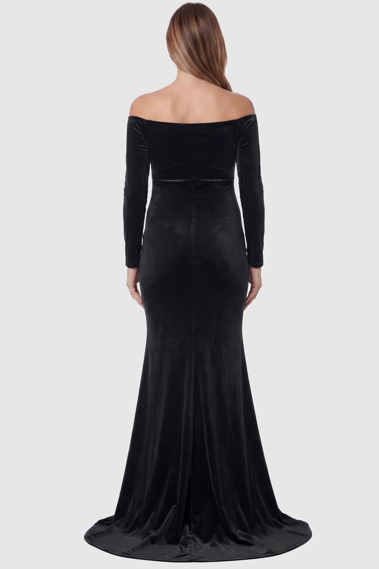 Velvet Long Fitted Sleeve Maternity Gown Velvet Long Fitted Sleeve Maternity Gown in black featuring an off-shoulder sweetheart neckline, empire waist, and mermaid skirt on pregnant model back view.
