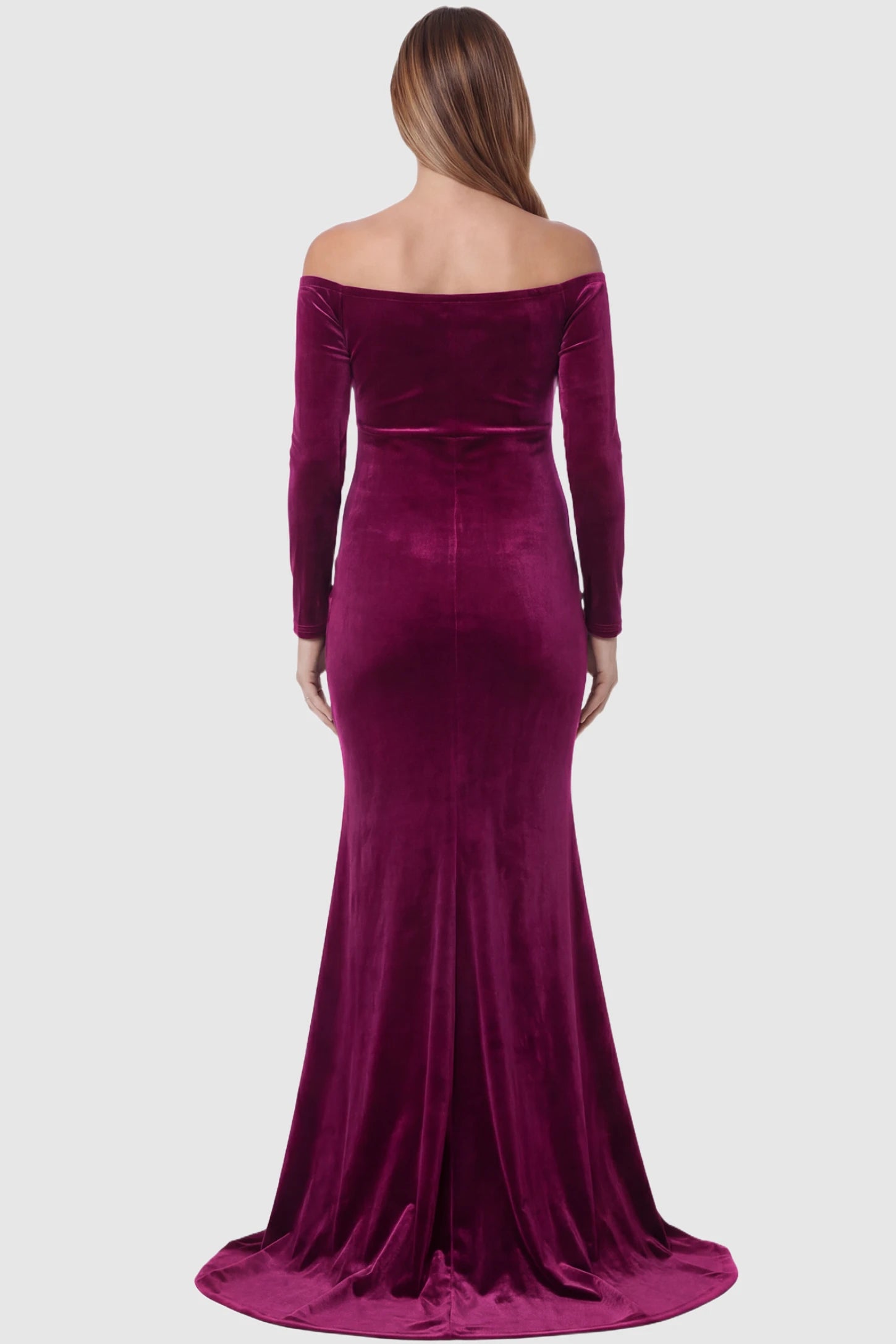 Velvet Long Fitted Sleeve Maternity Gown Velvet Long Fitted Sleeve Maternity Gown in burgundy featuring an off-shoulder sweetheart neckline, empire waist, and mermaid skirt on pregnant model back view.