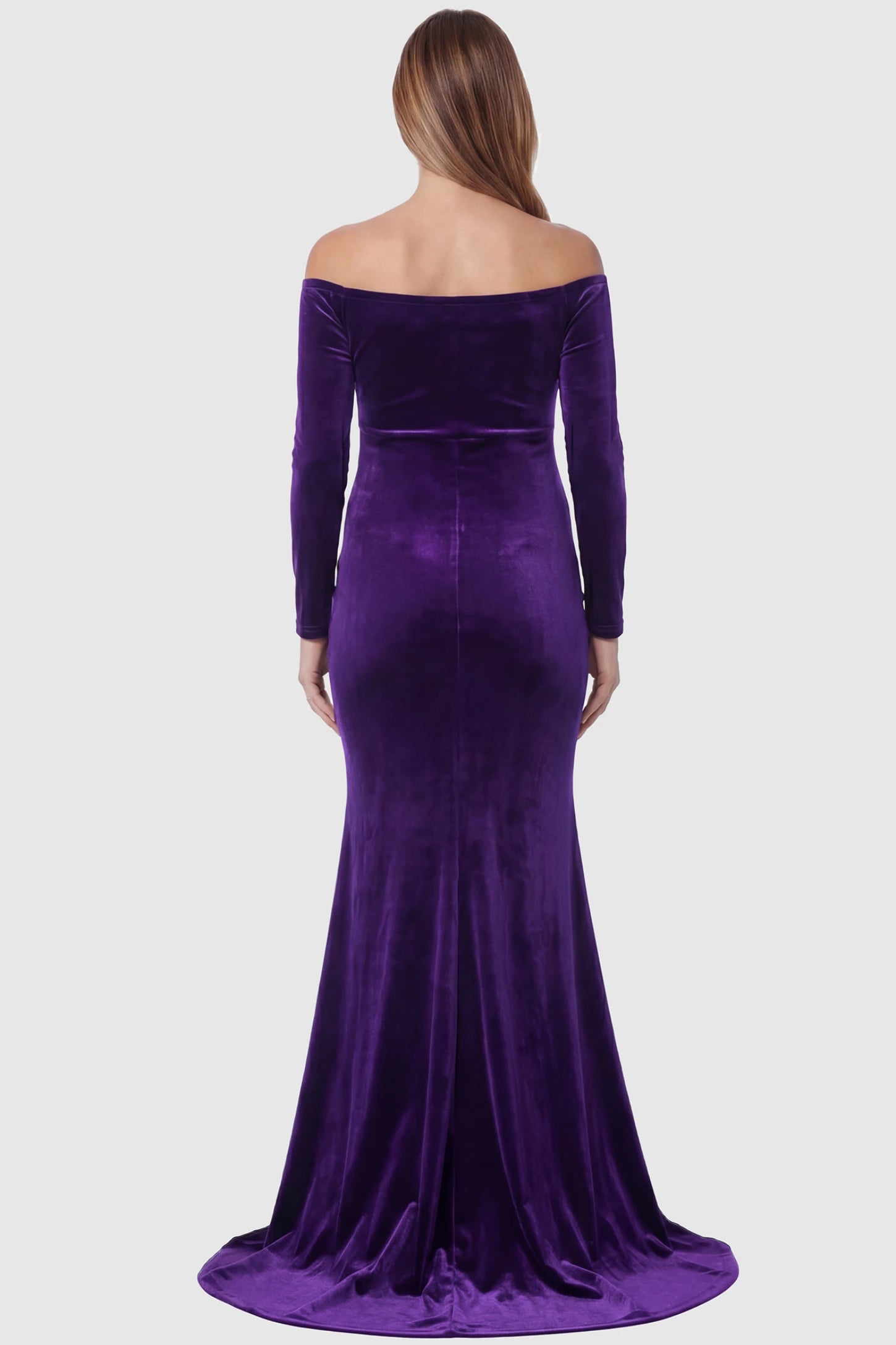 Velvet Long Fitted Sleeve Maternity Gown Velvet Long Fitted Sleeve Maternity Gown in purple featuring an off-shoulder sweetheart neckline, empire waist, and mermaid skirt on pregnant model back view.